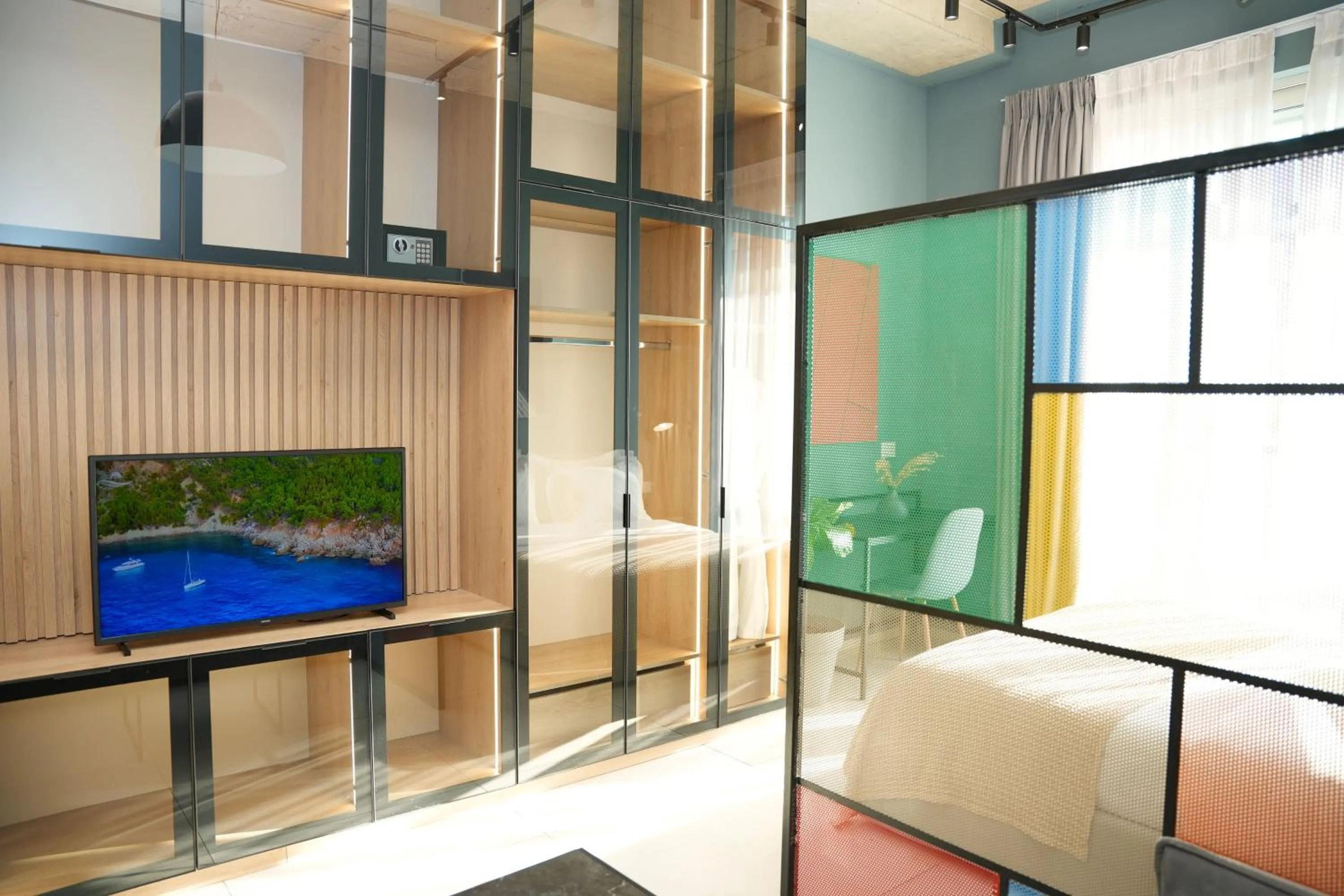 Bed in Ambassador Skyline Apartments