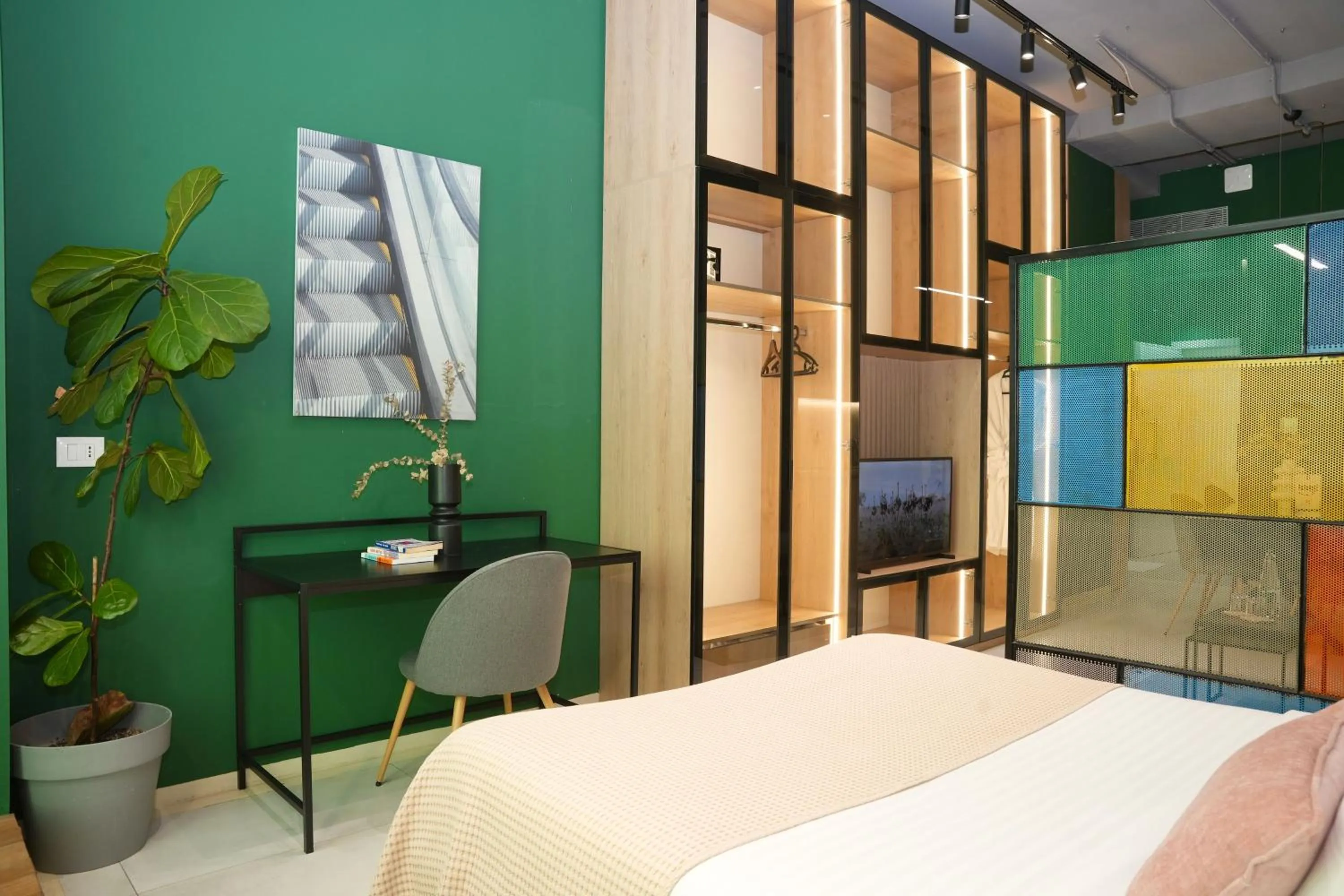 Bed in Ambassador Skyline Apartments