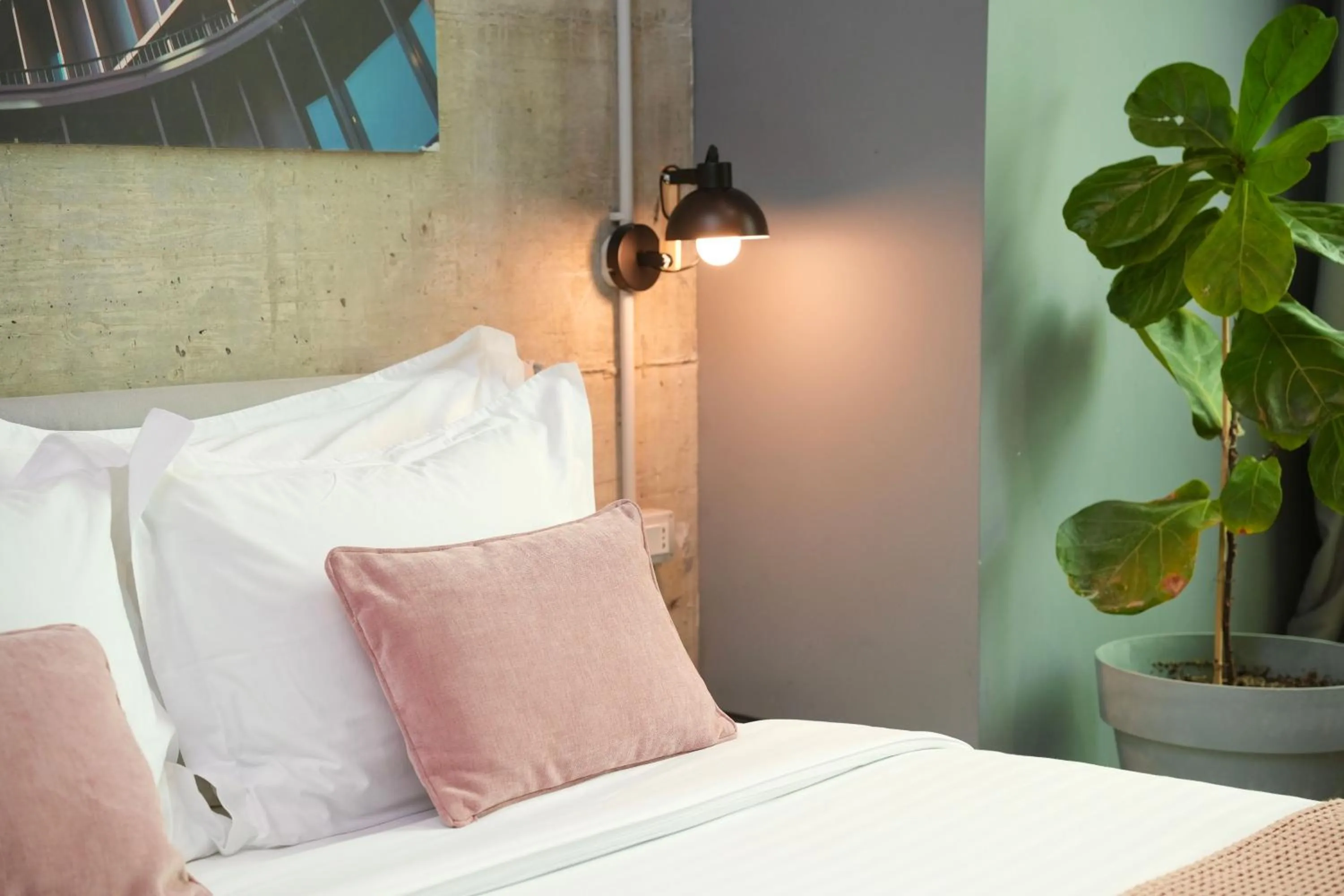 Bed in Ambassador Skyline Apartments