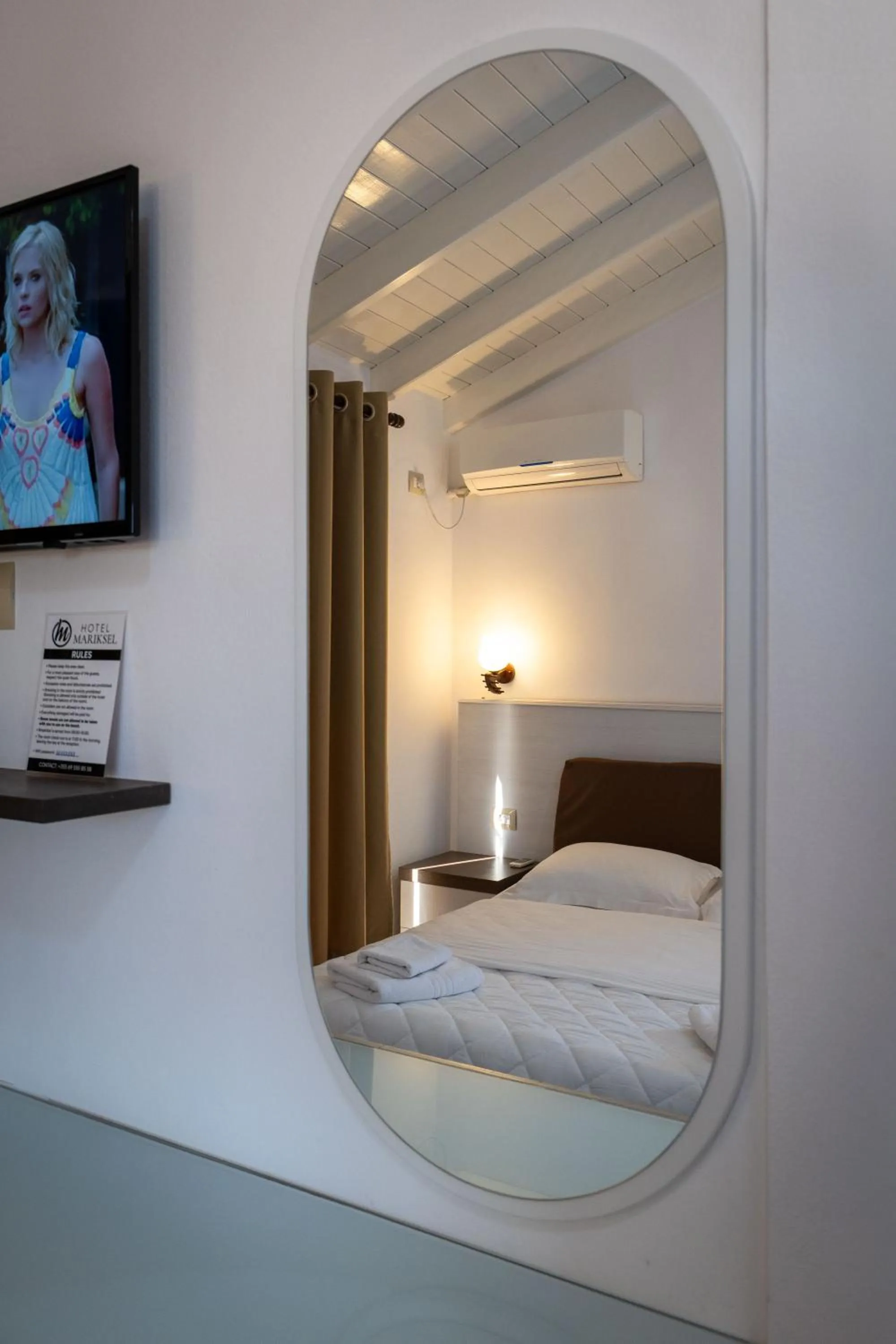 TV and multimedia, Bed in Mariksel HOTEL