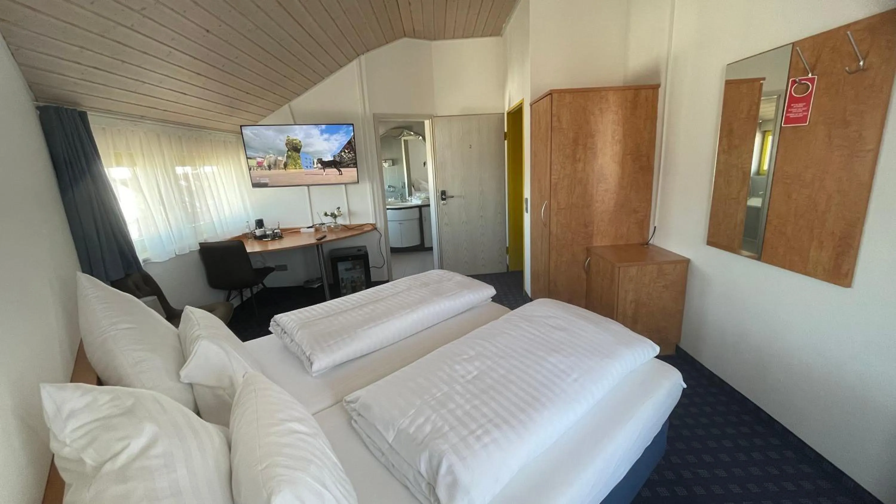 Bed in KRYSTALL Hotel