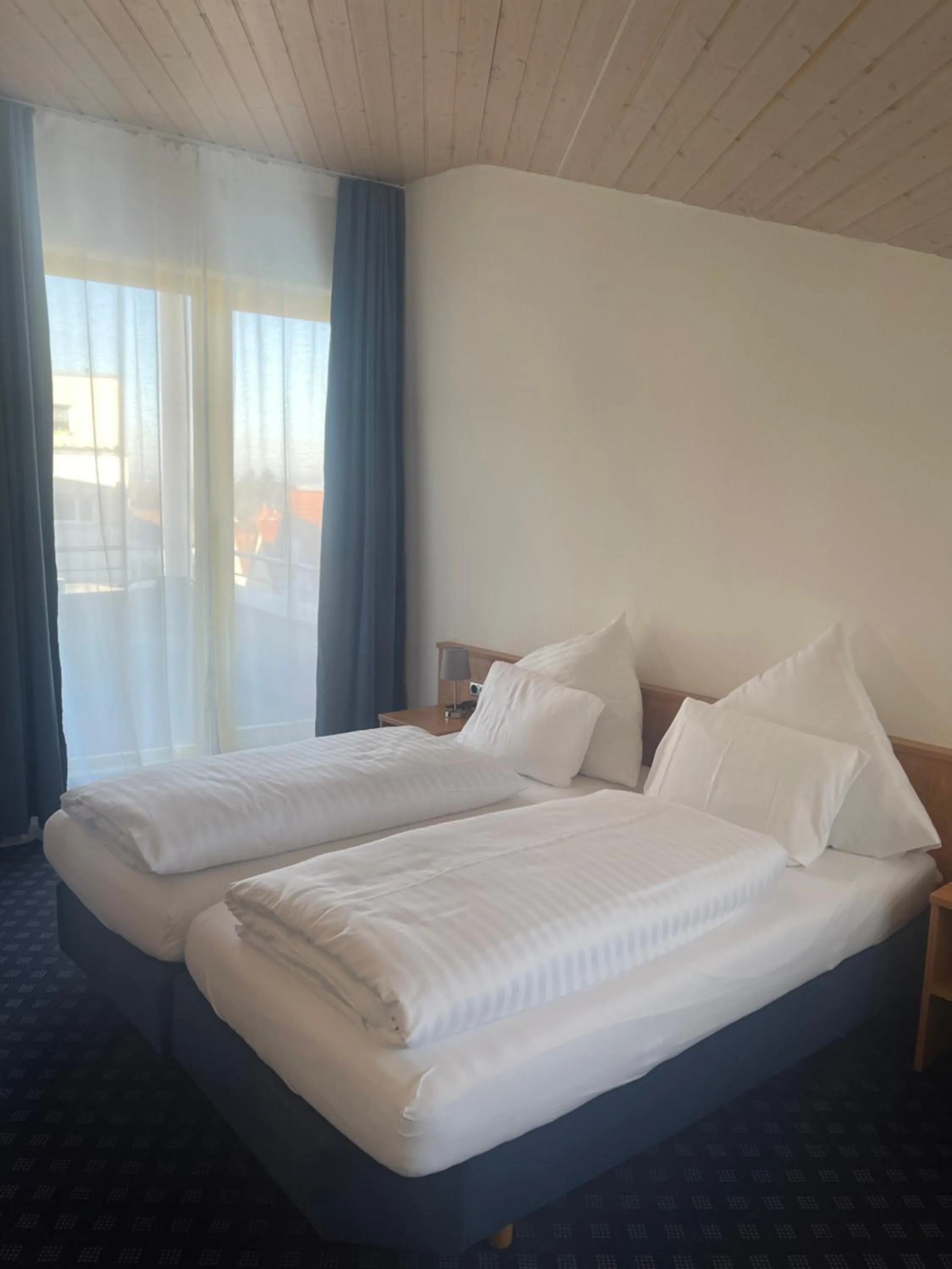 Bed in KRYSTALL Hotel