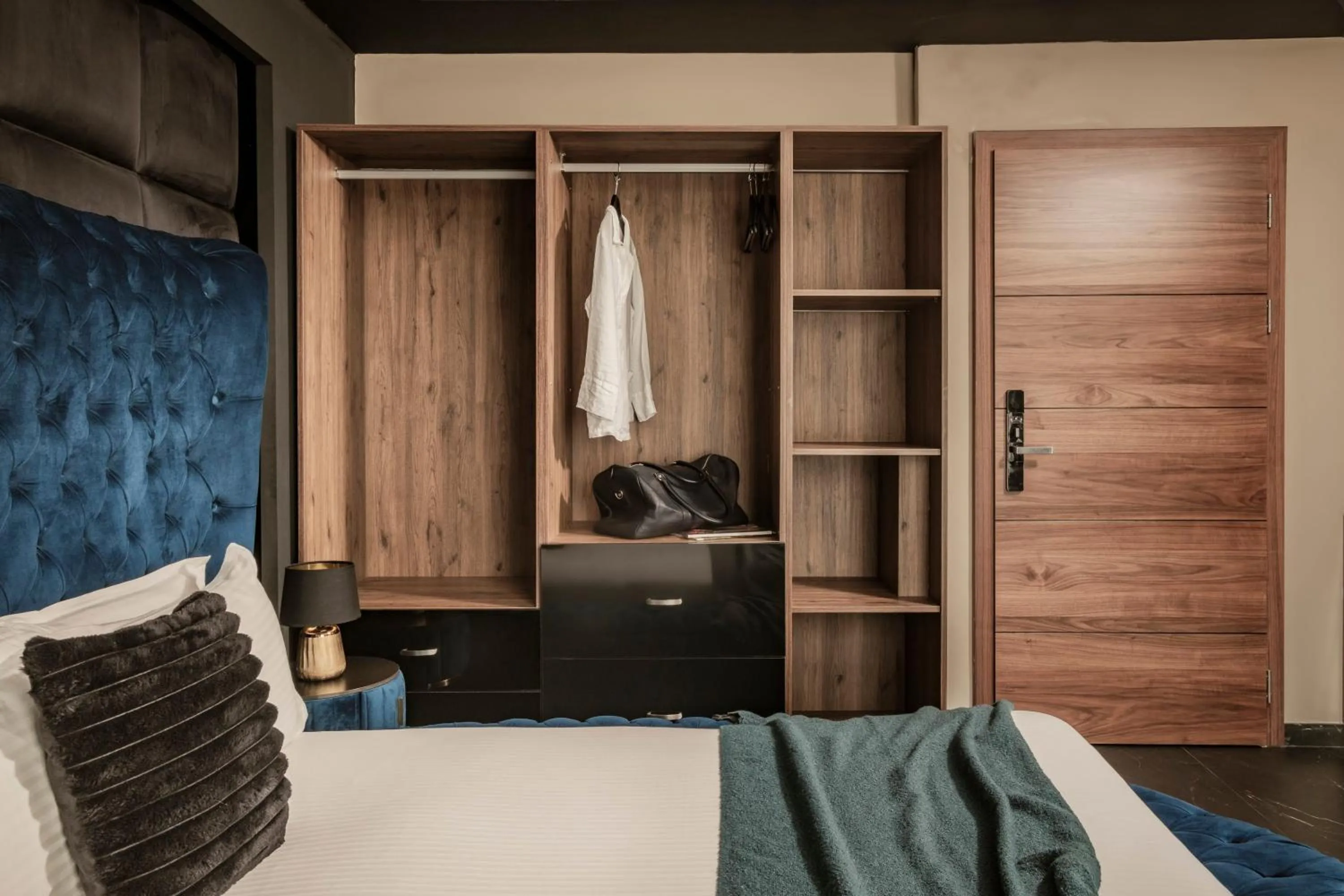 wardrobe, Bed in Damare Resort & SPA