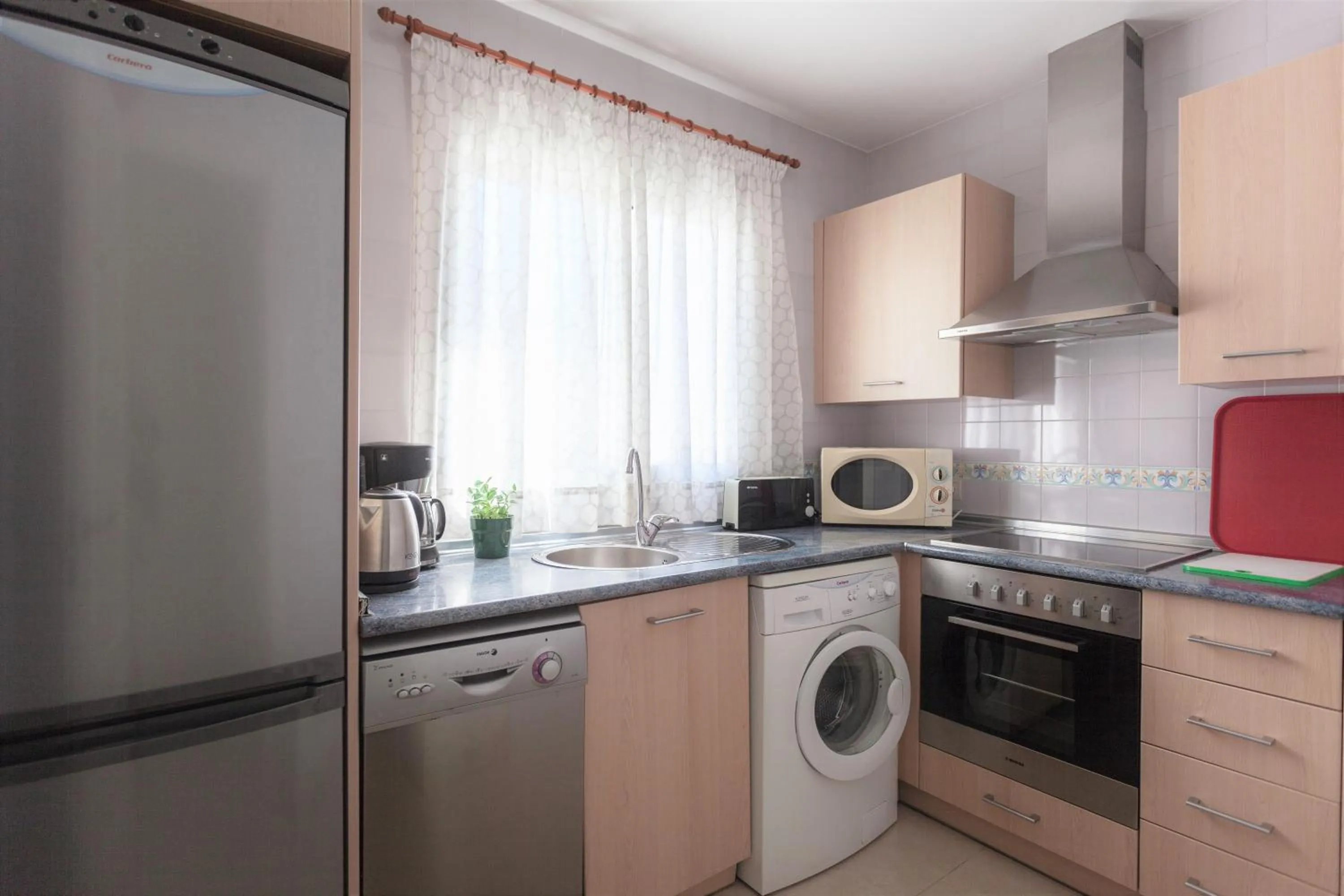 Kitchen or kitchenette in Apartamentos Marina Turquesa