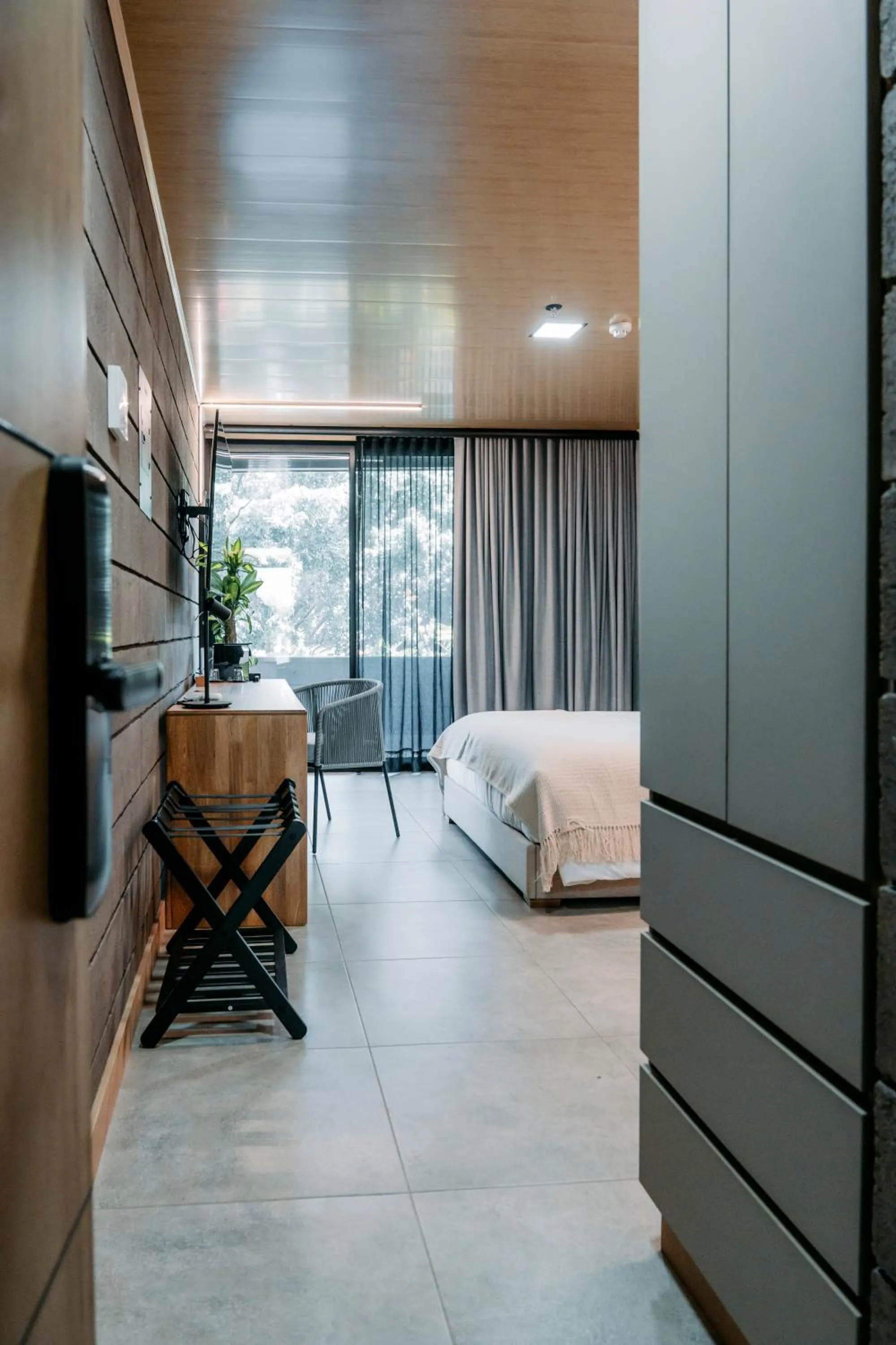 Bed in Hotel Living by Armoniko