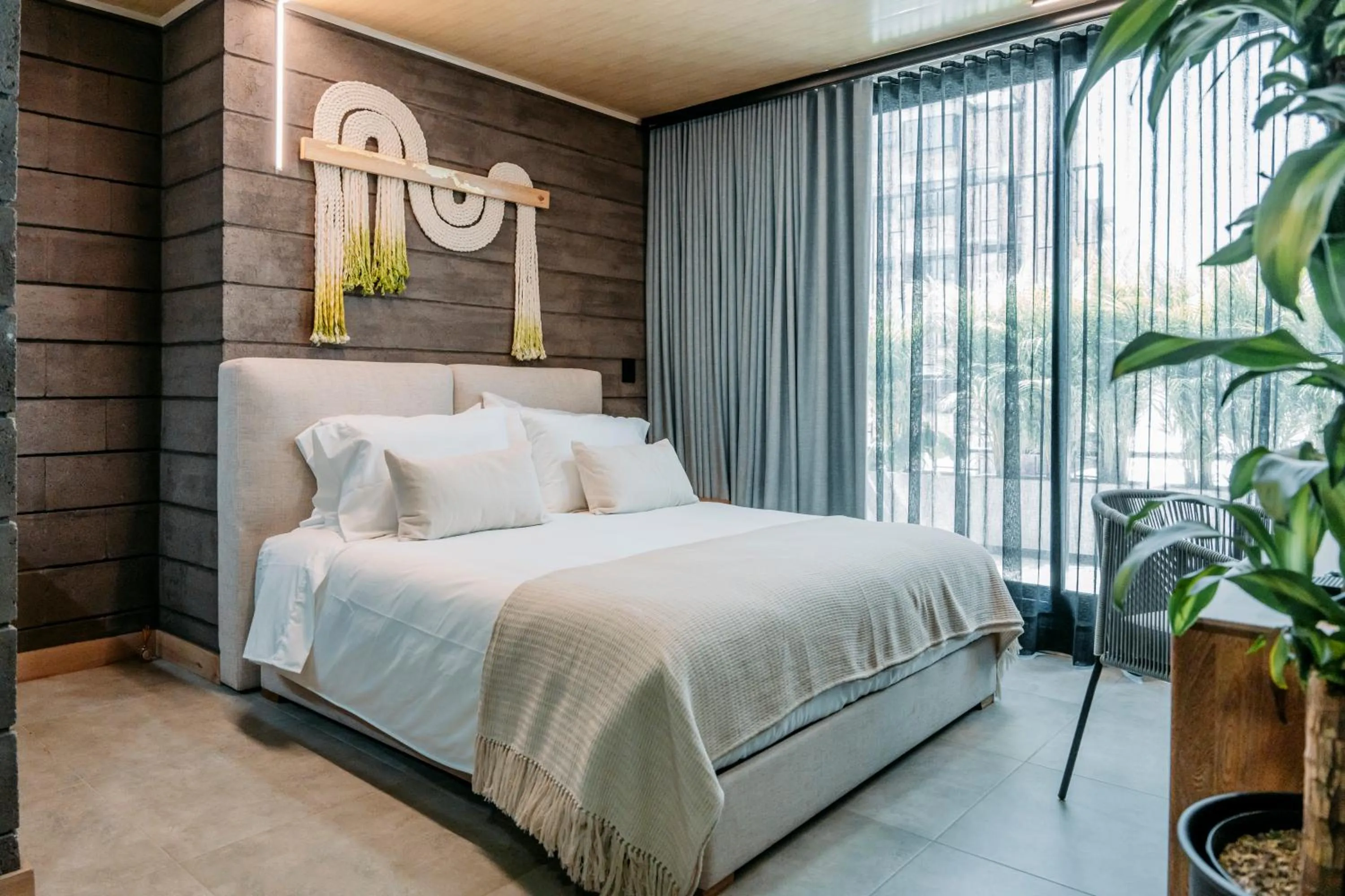 Bed in Hotel Living by Armoniko