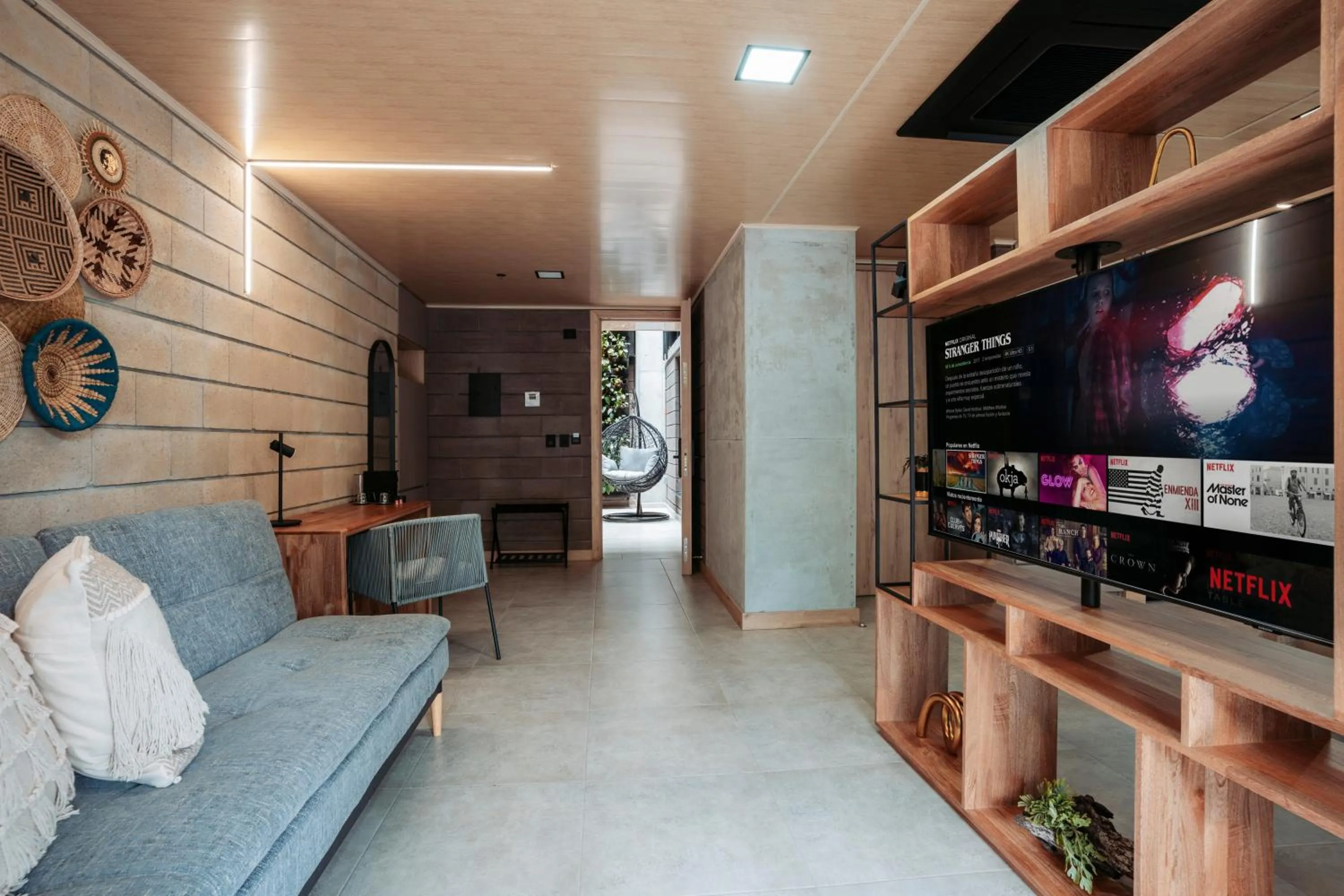 Communal lounge/ TV room in Hotel Living by Armoniko