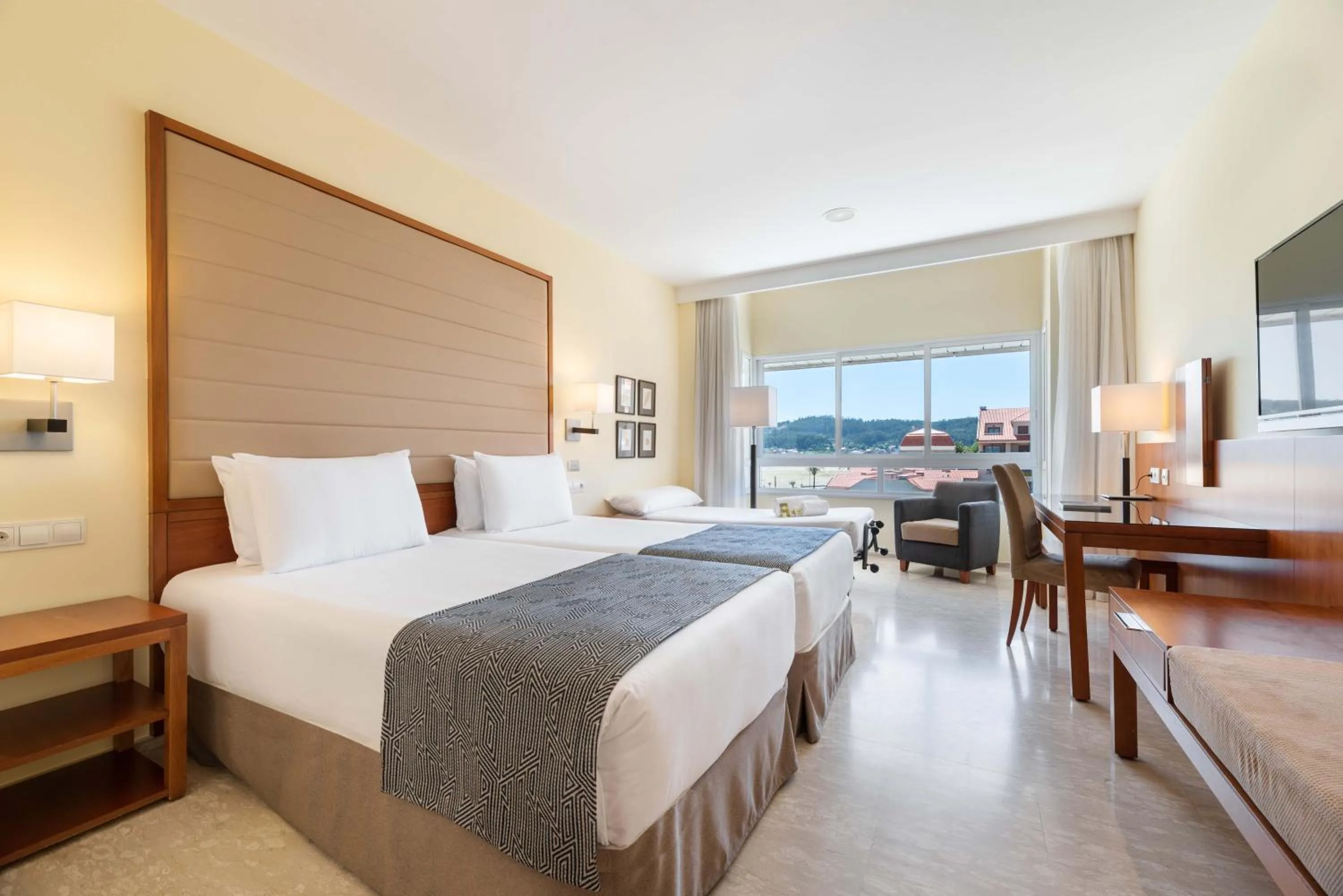 Bed in Eurostars Isla de La Toja