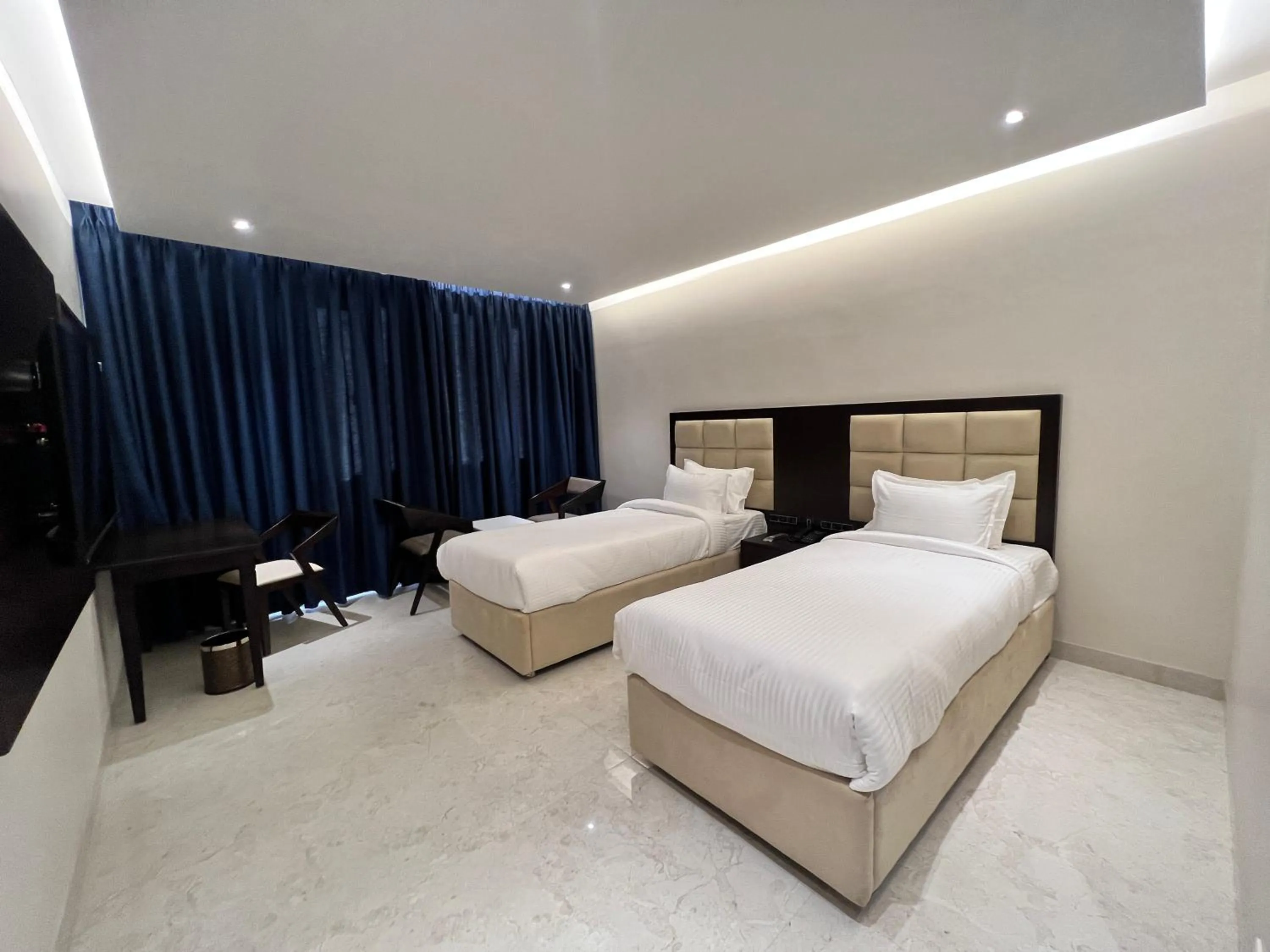 Bed in Mayur Belgaum Presidency Hotel & Spa