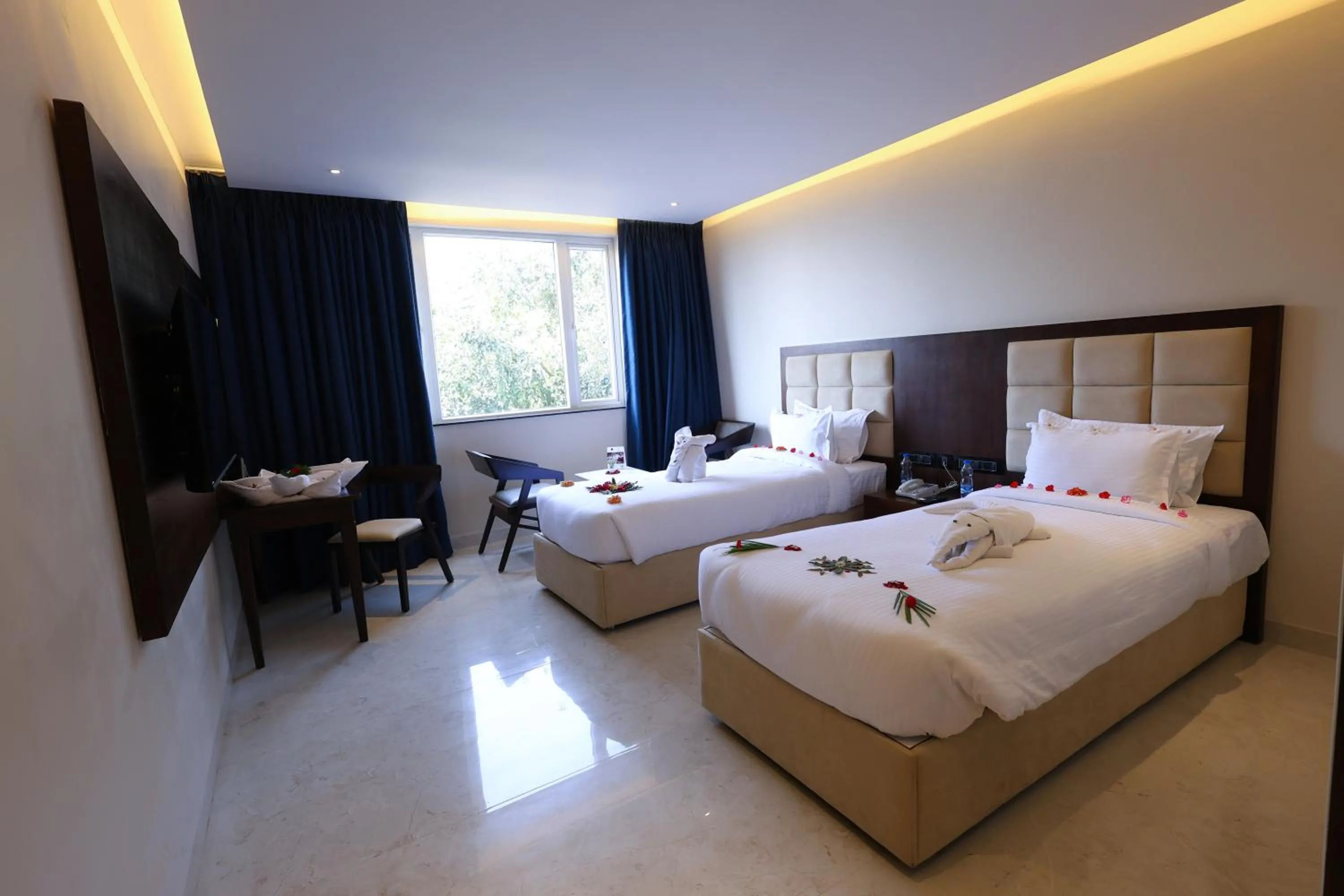 Bed in Mayur Belgaum Presidency Hotel & Spa