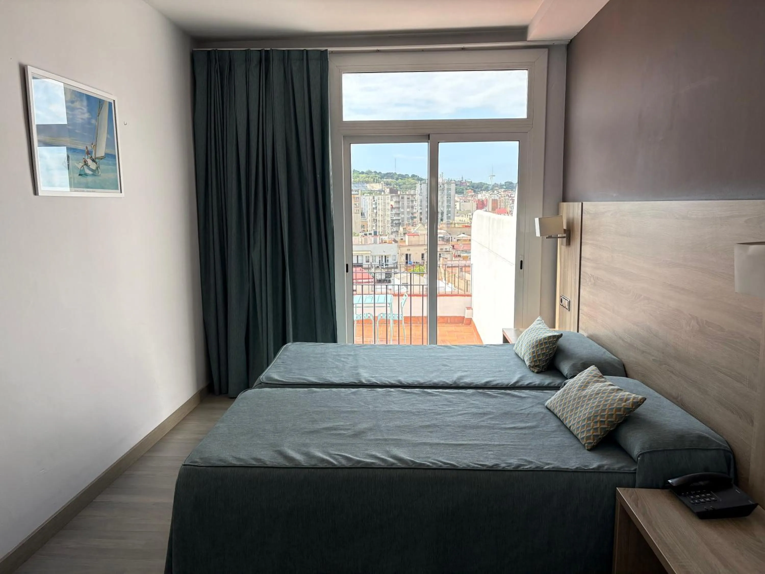 Bed in Ramblas Hotel