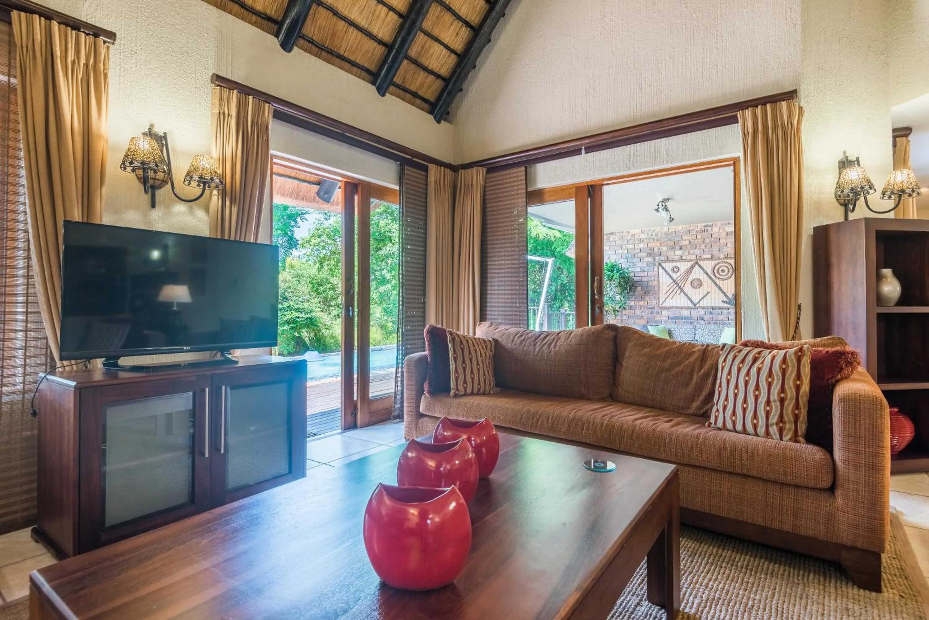 Living room in Kruger Park Lodge Unit No 521 with Private Pool