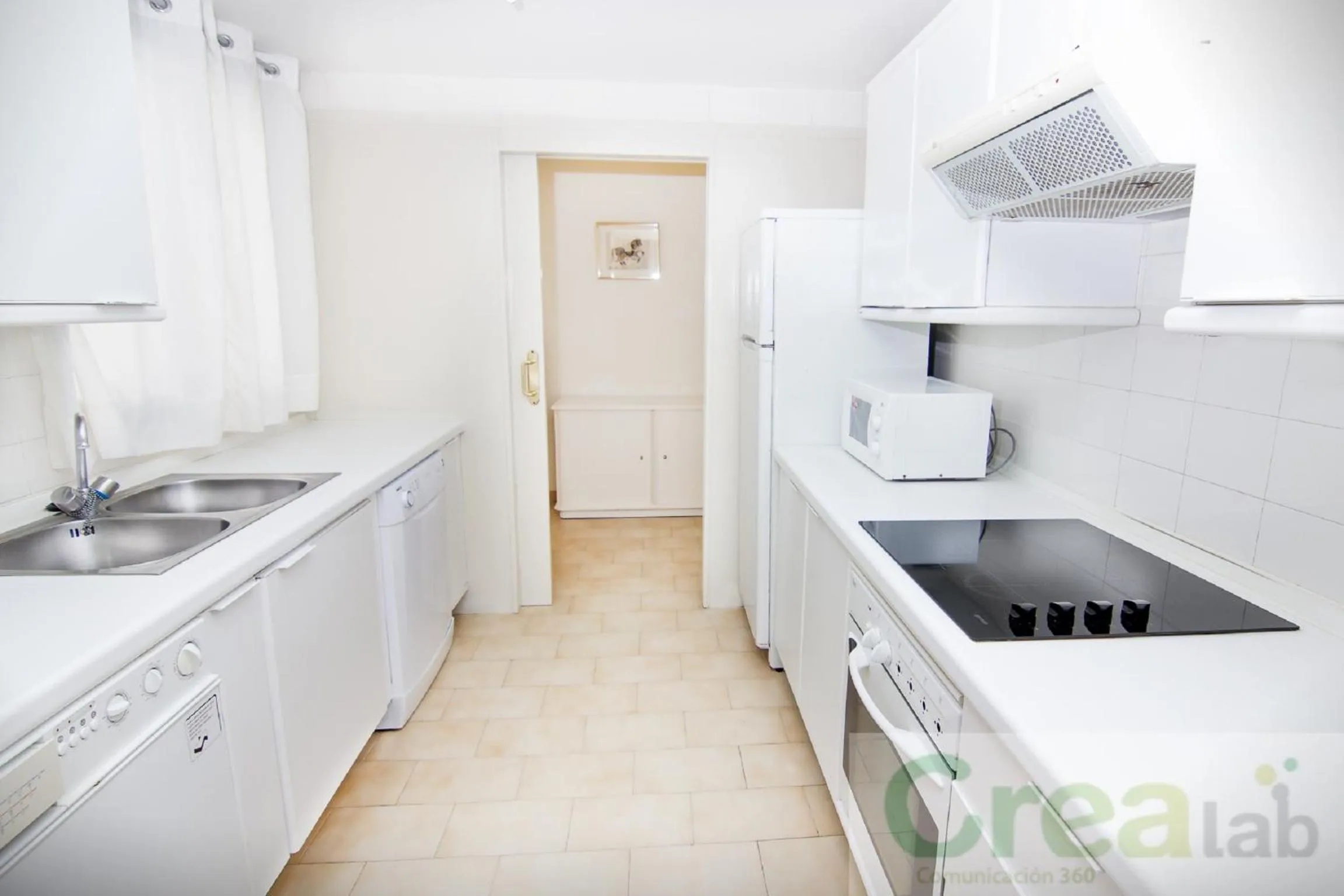 Kitchen or kitchenette in Park Plaza Suites Apartamentos