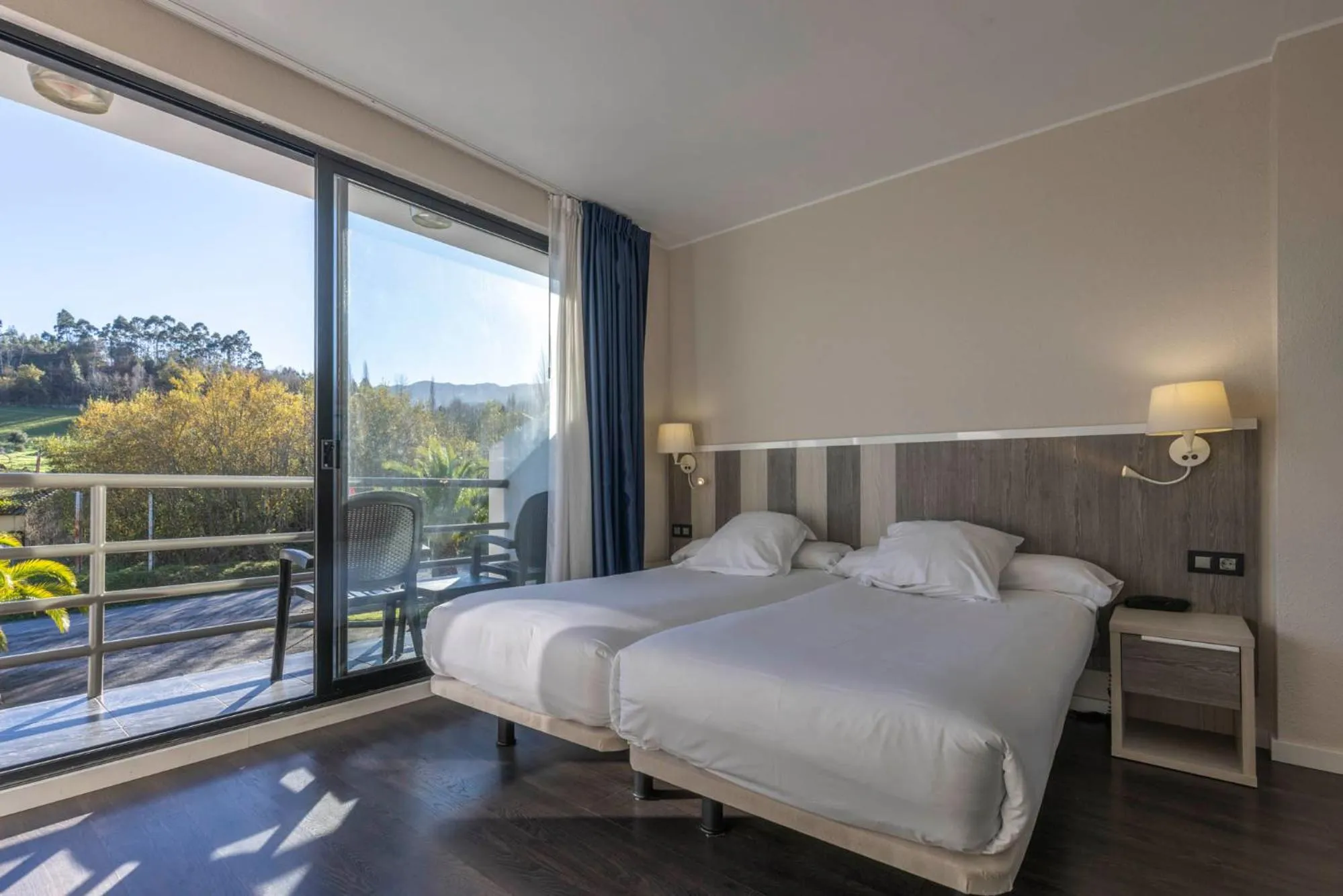 View (from property/room), Bed in Hotel La Palma de Llanes