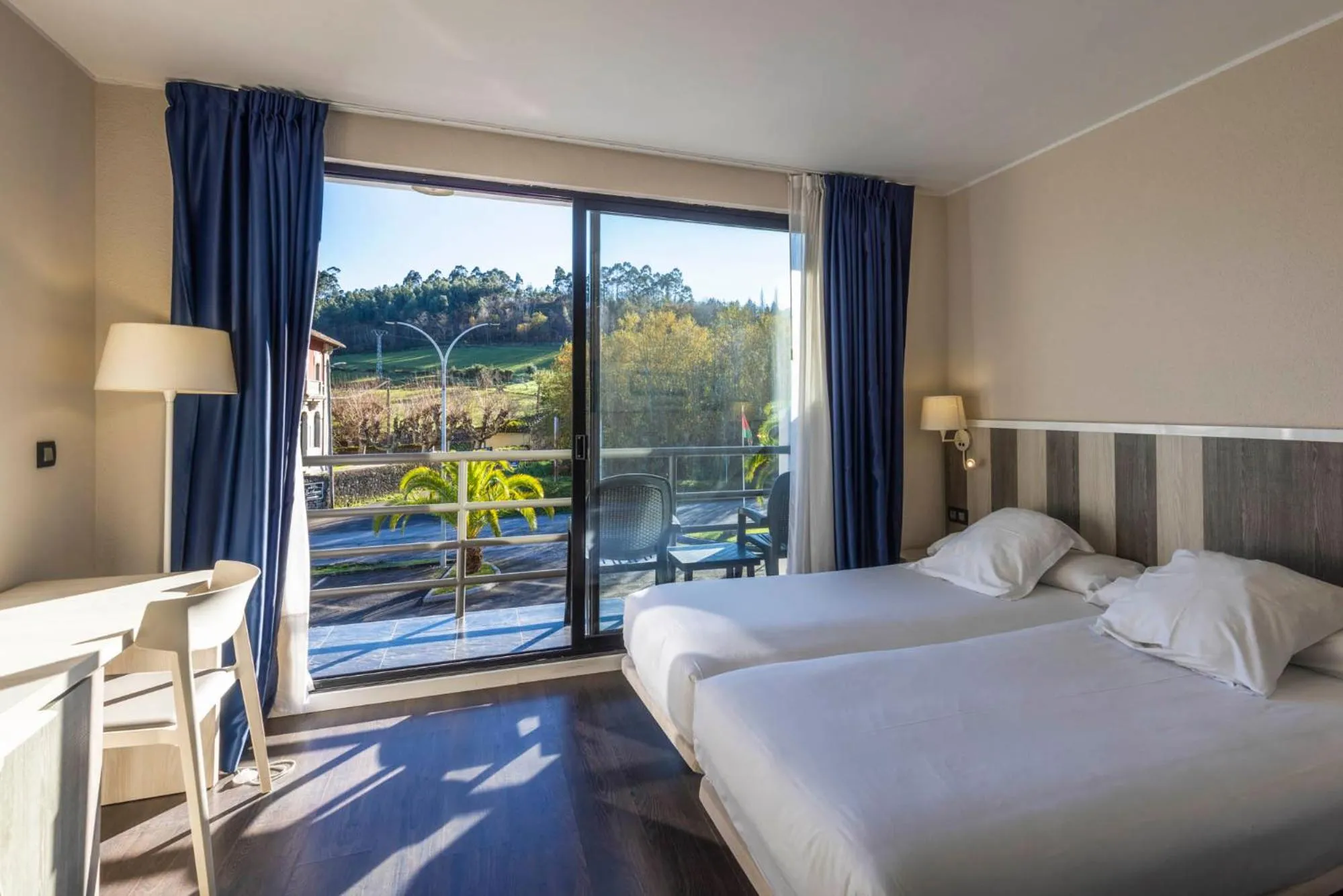 View (from property/room), Bed in Hotel La Palma de Llanes