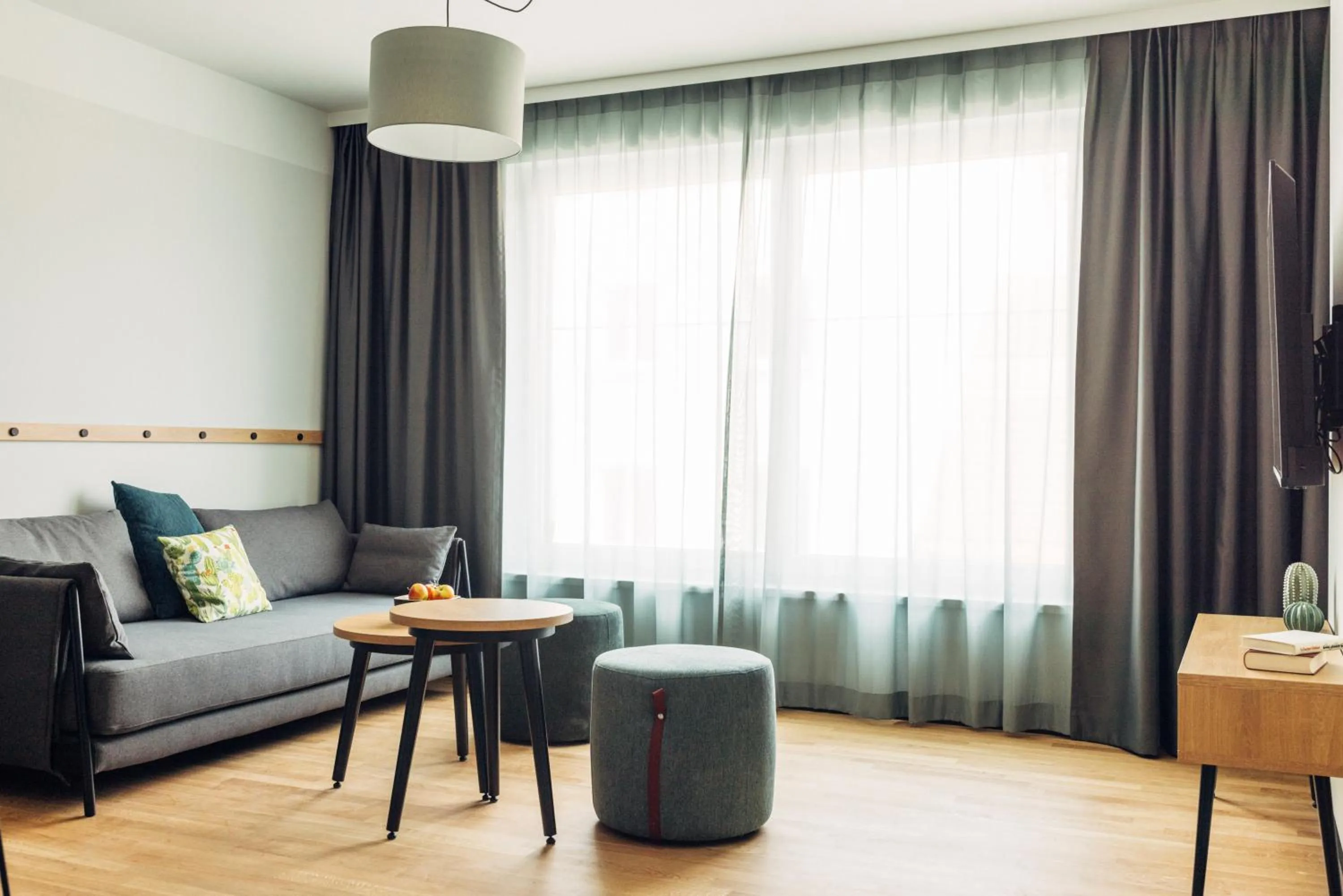 Living room in harry's home Villach hotel & apartments