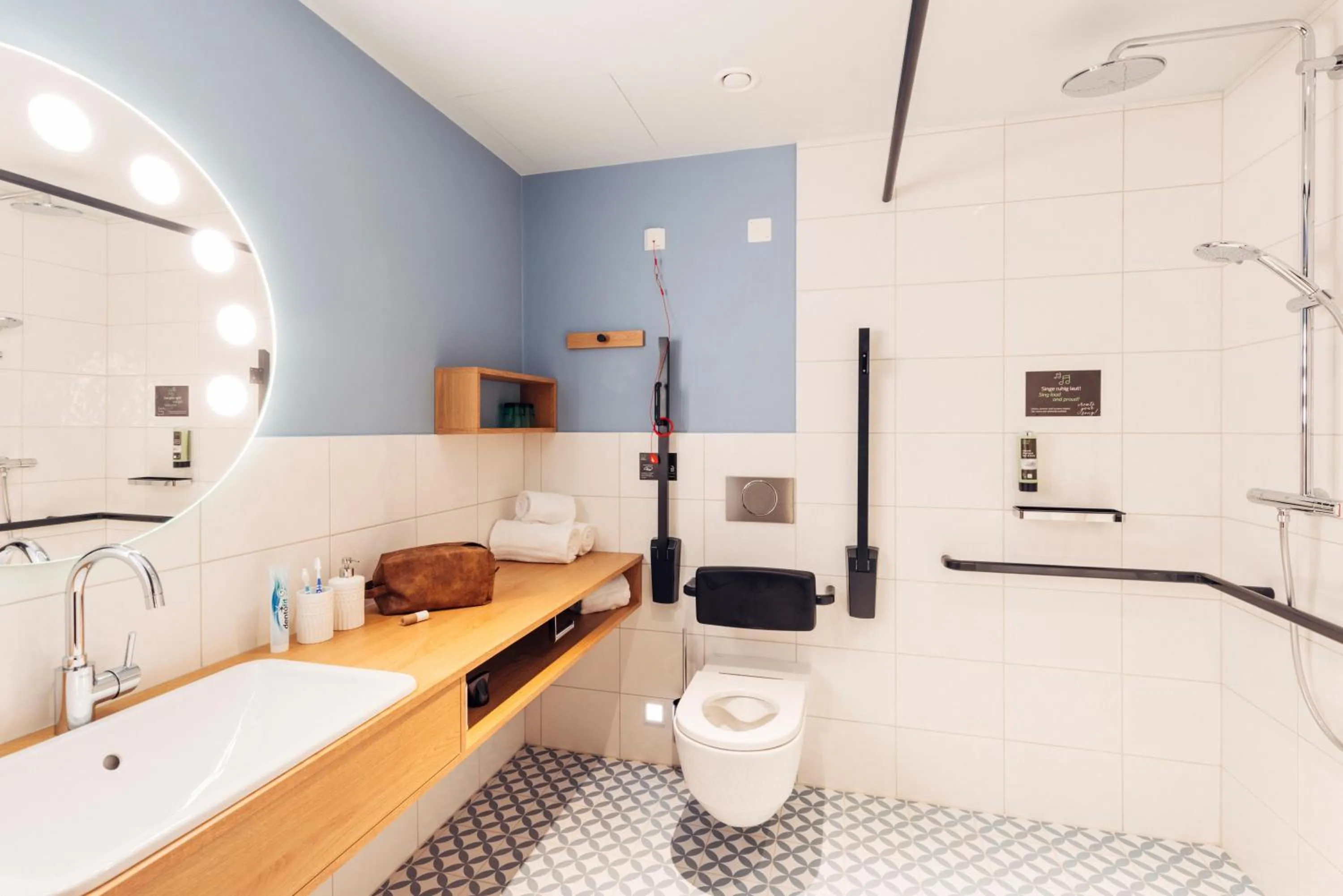 Bathroom in harry's home Villach hotel & apartments