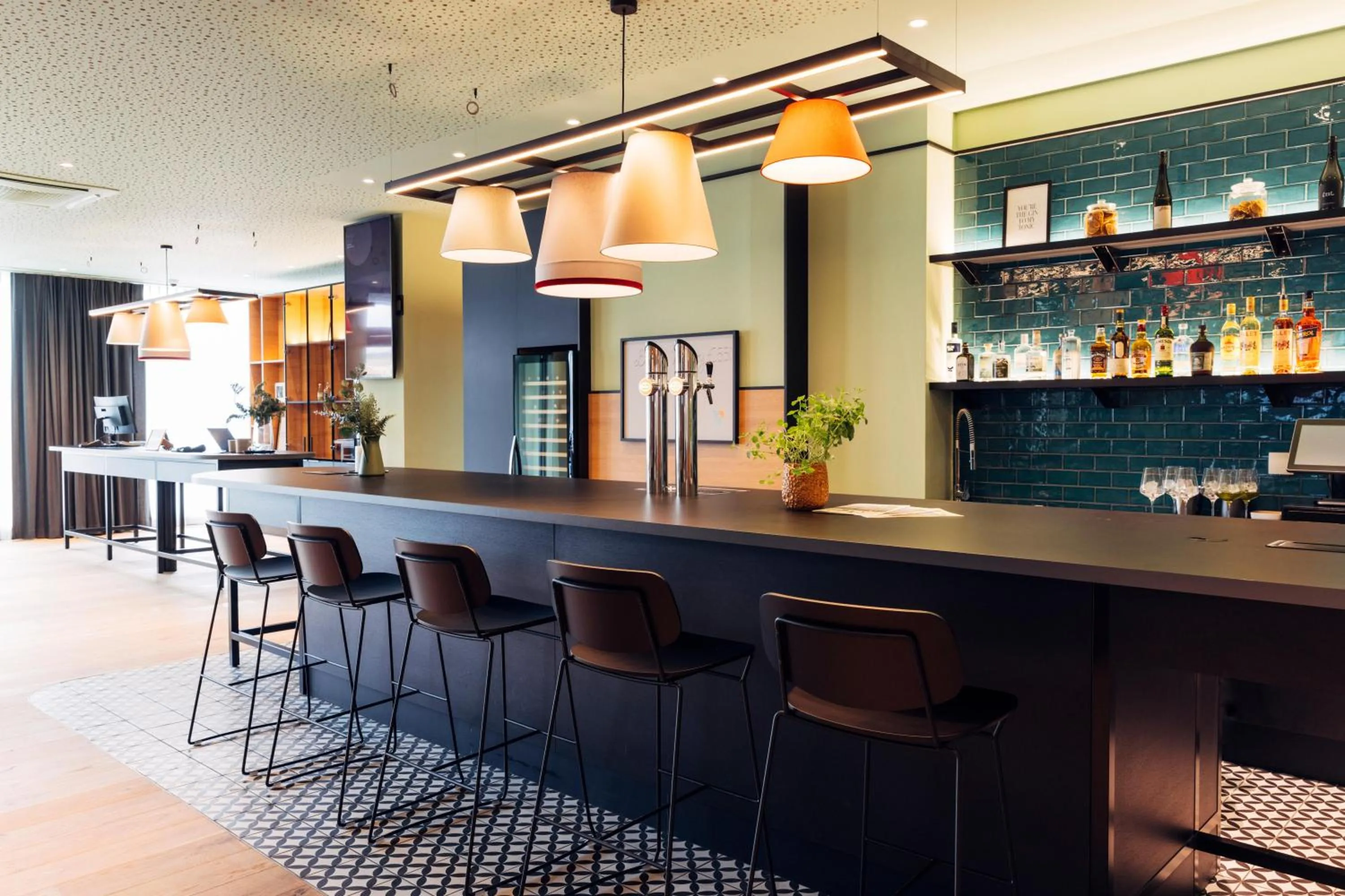 Lounge or bar in harry's home Villach hotel & apartments