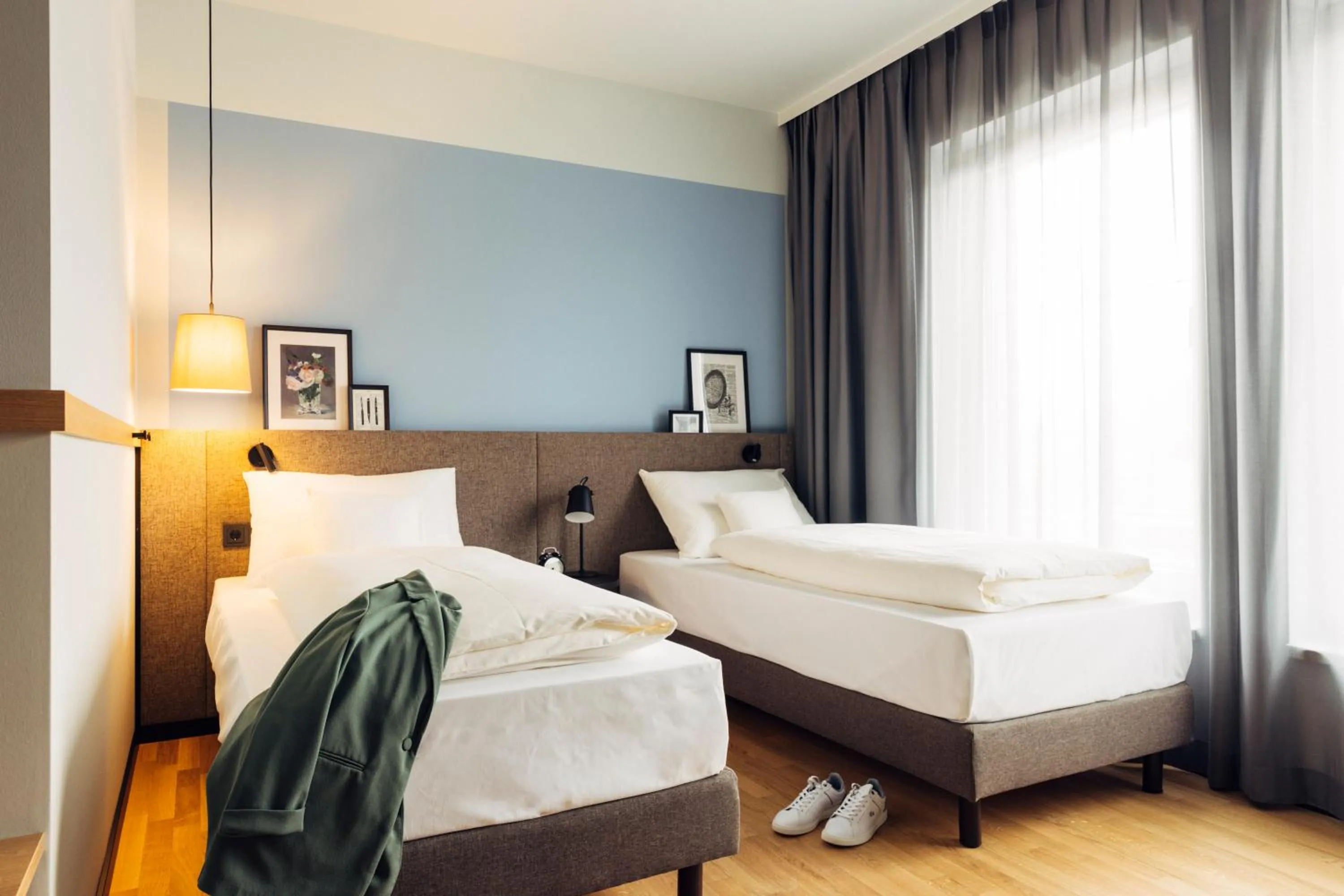 Bed in harry's home Villach hotel & apartments