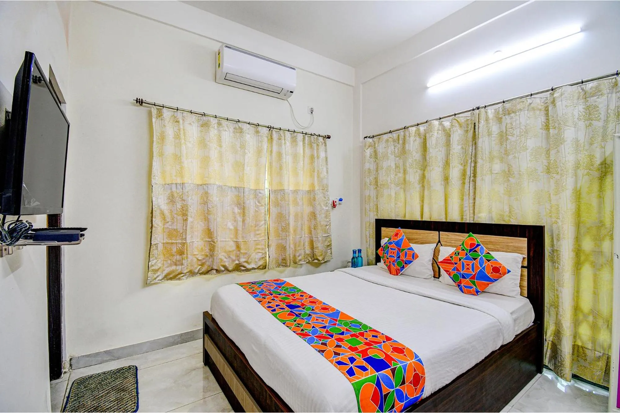 Bed in FabExpress Moon Residency