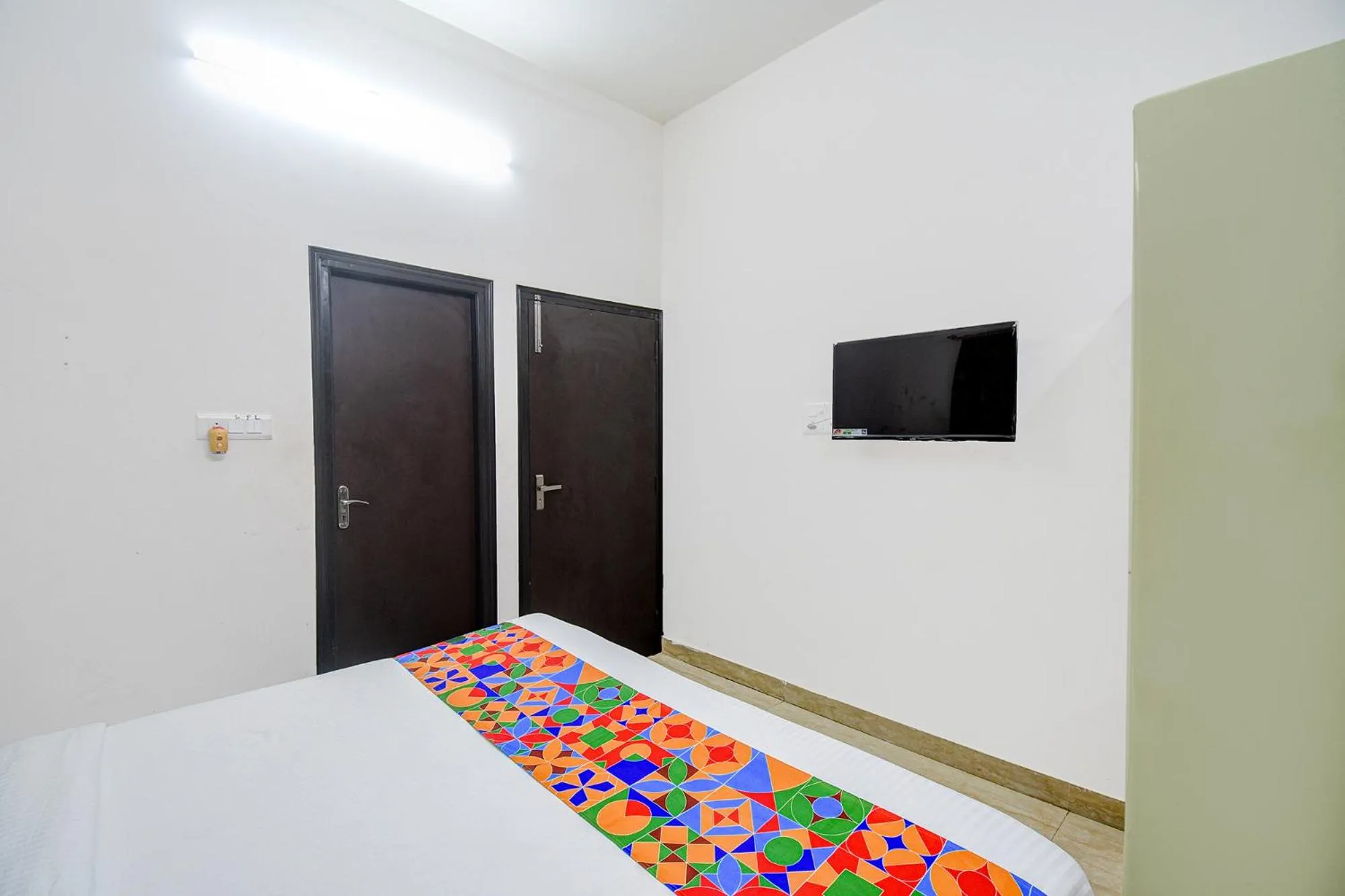 Bed in FabExpress Moon Residency