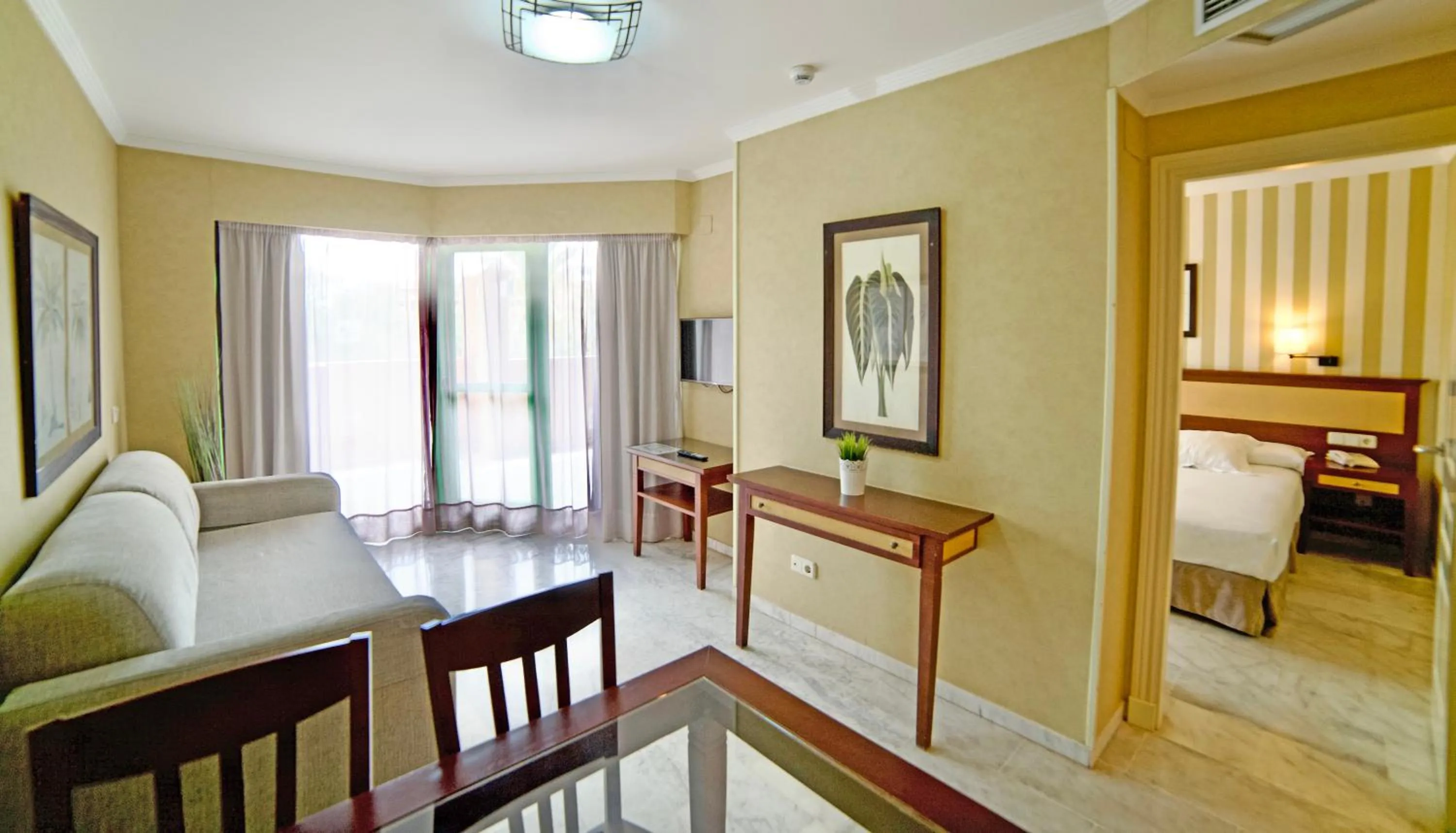 Photo of the whole room, Bed in Holiday World RIWO Hotel.