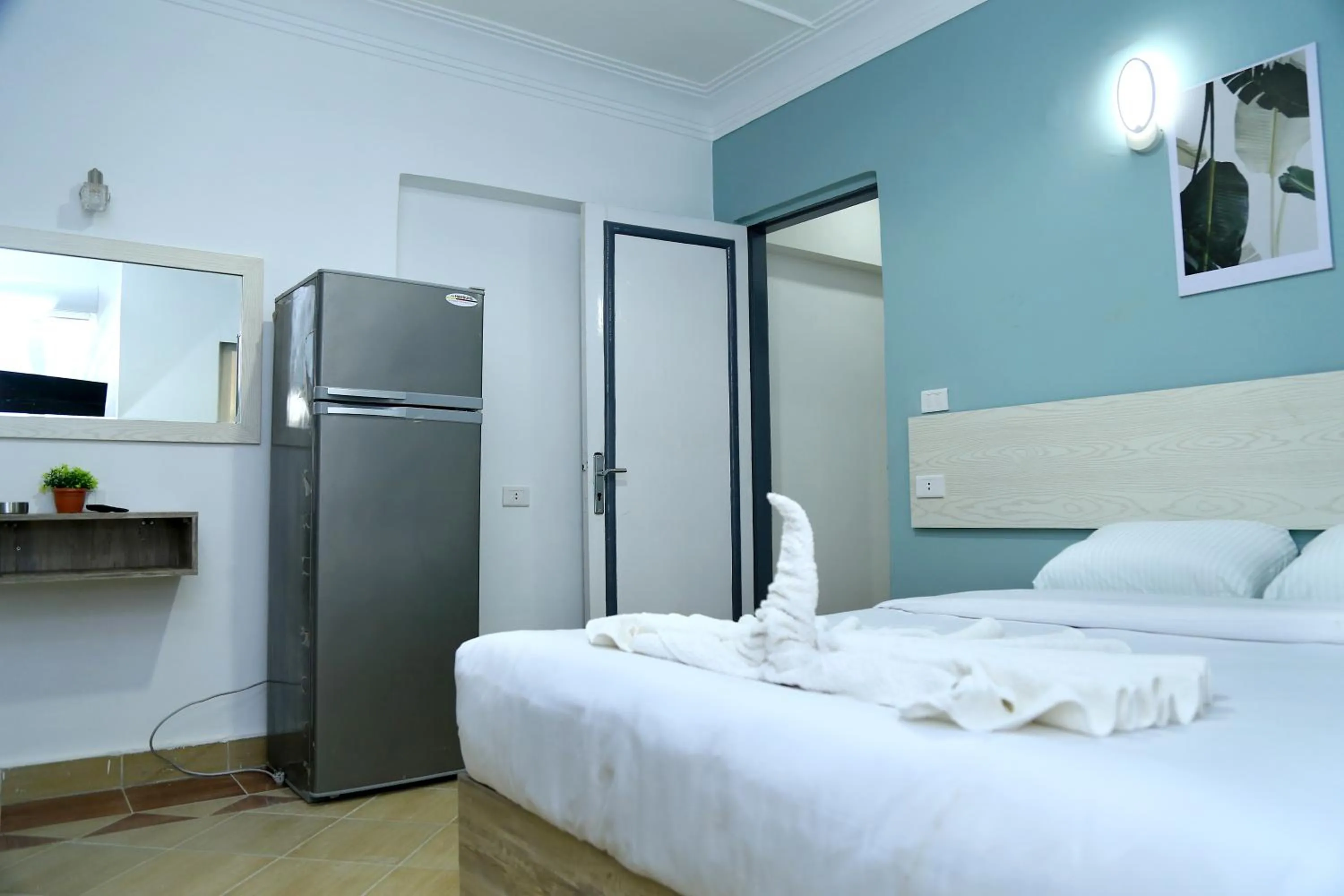 towels, Bed in Lamera Hotel