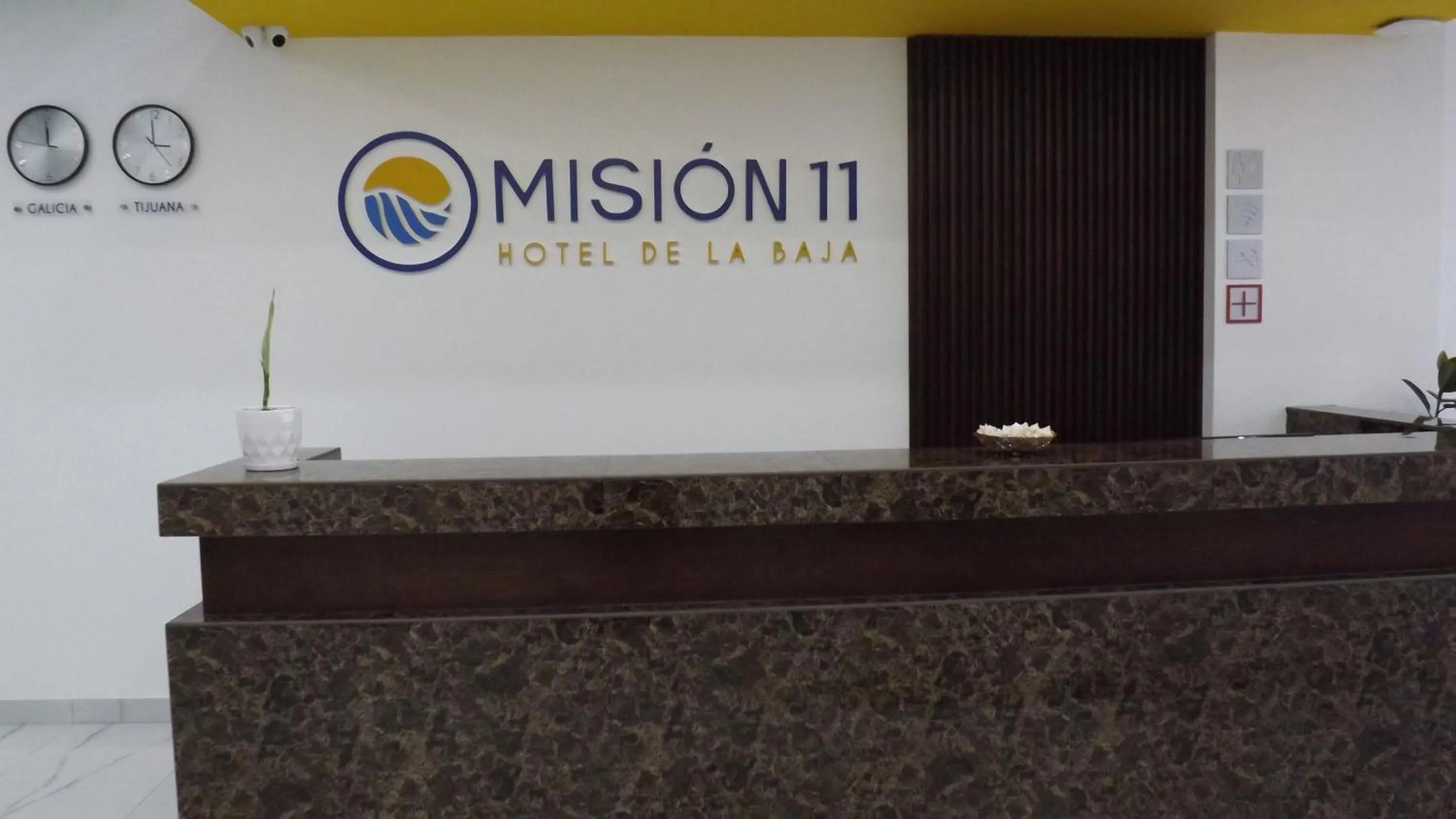 Property logo or sign in HOTEL MISION 11