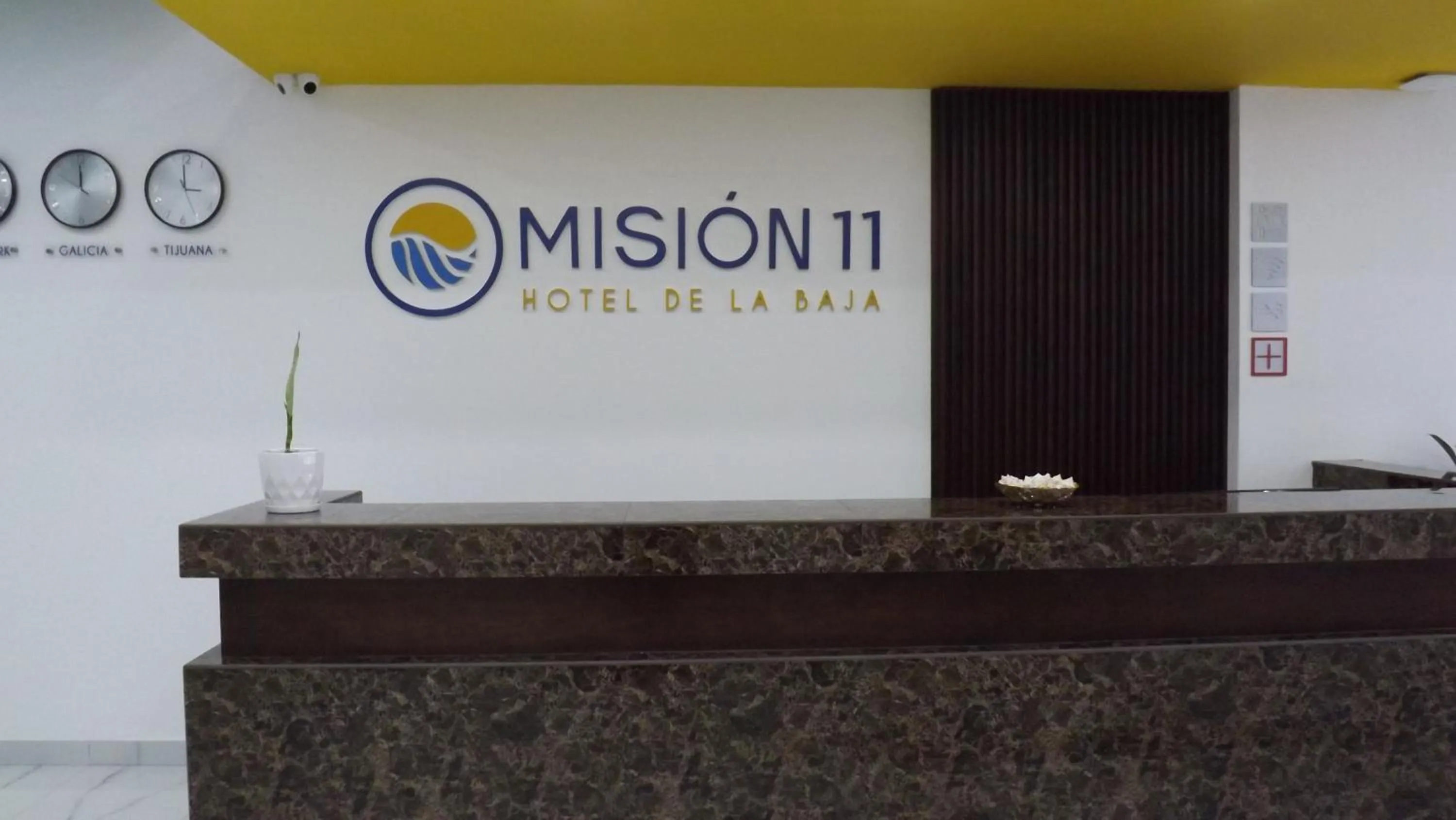 Property logo or sign in HOTEL MISION 11