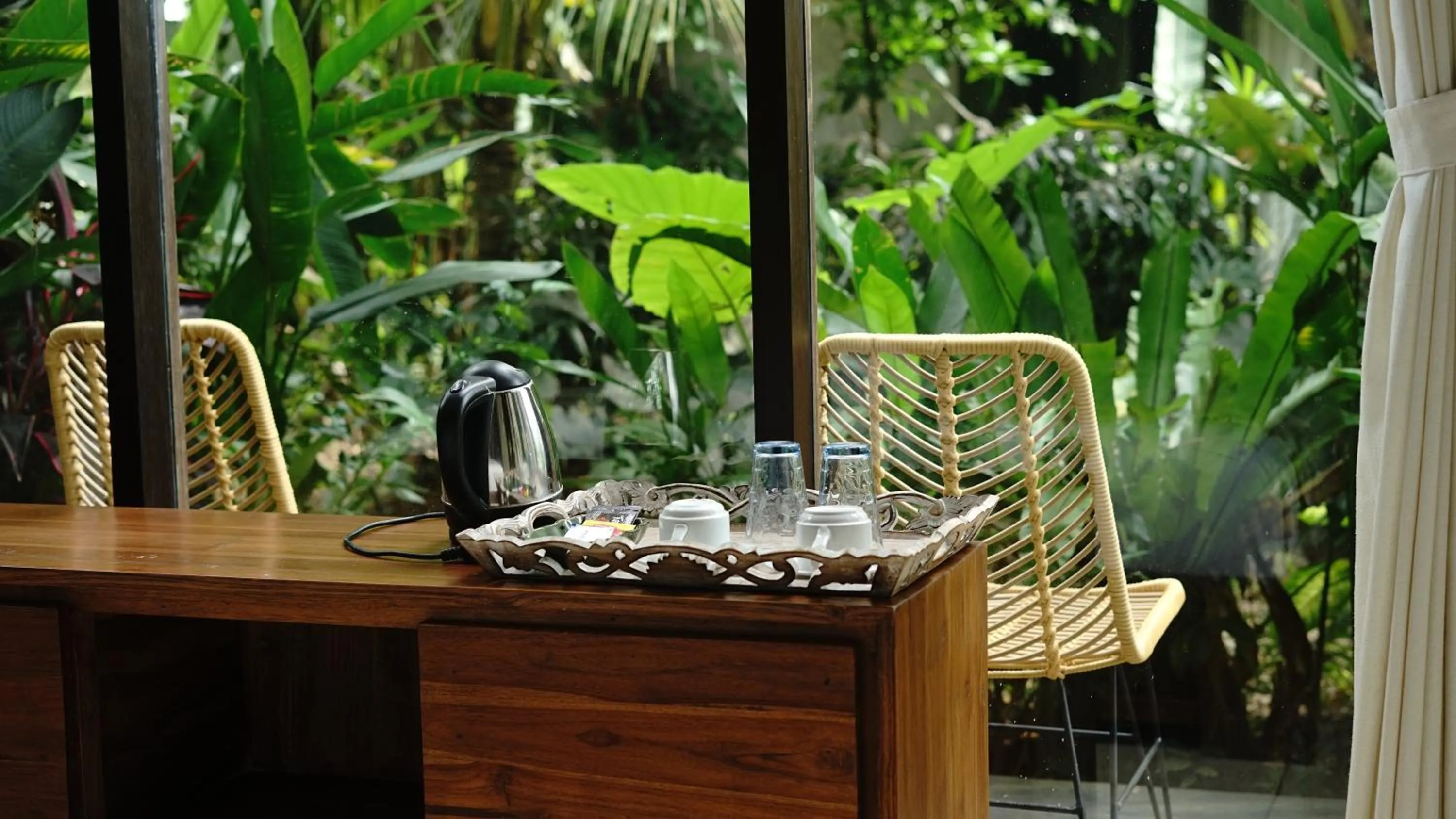 Seating area in Green Tree House Villa Ubud