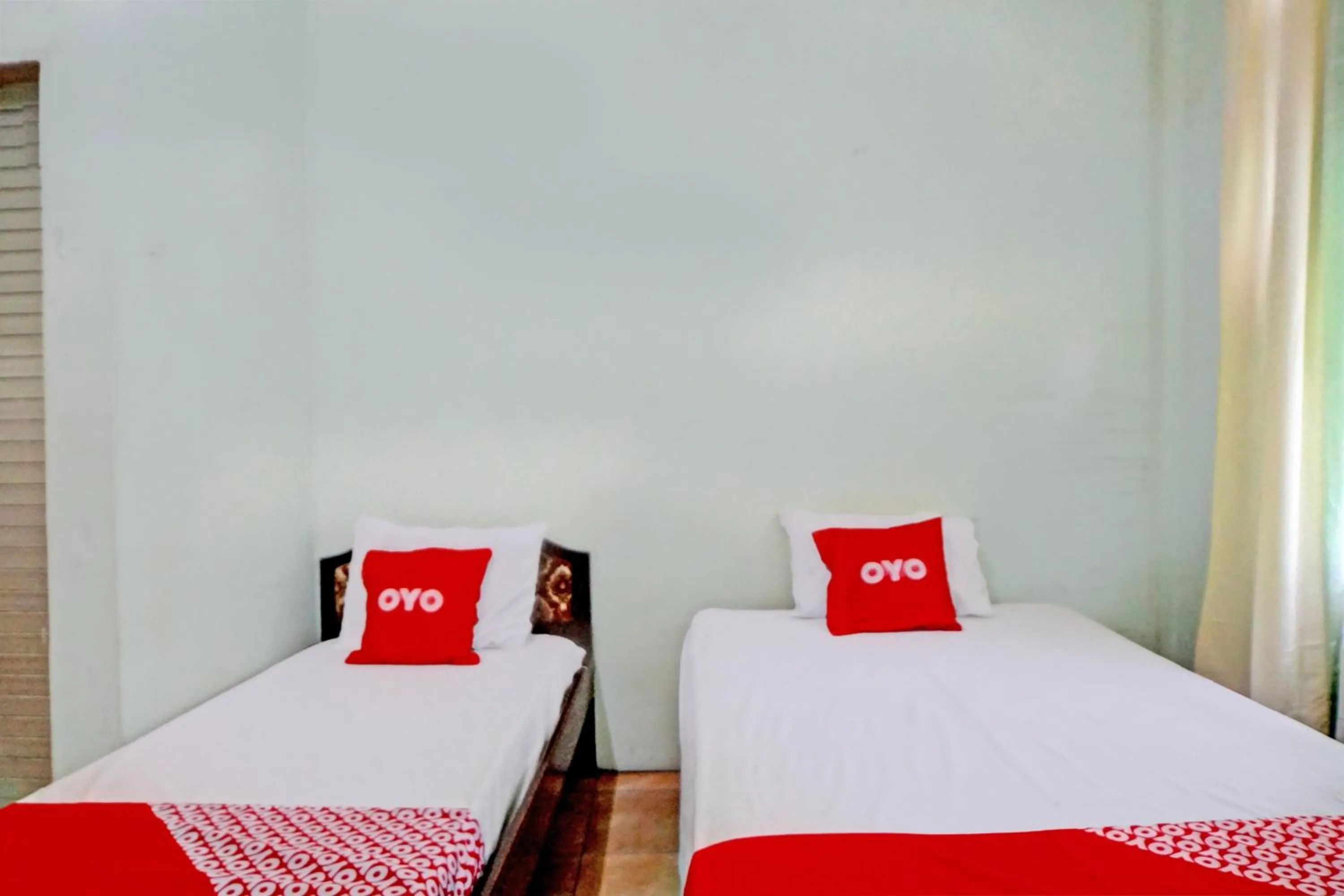 Bedroom, Bed in Hotel O Onasis Syariah Inn