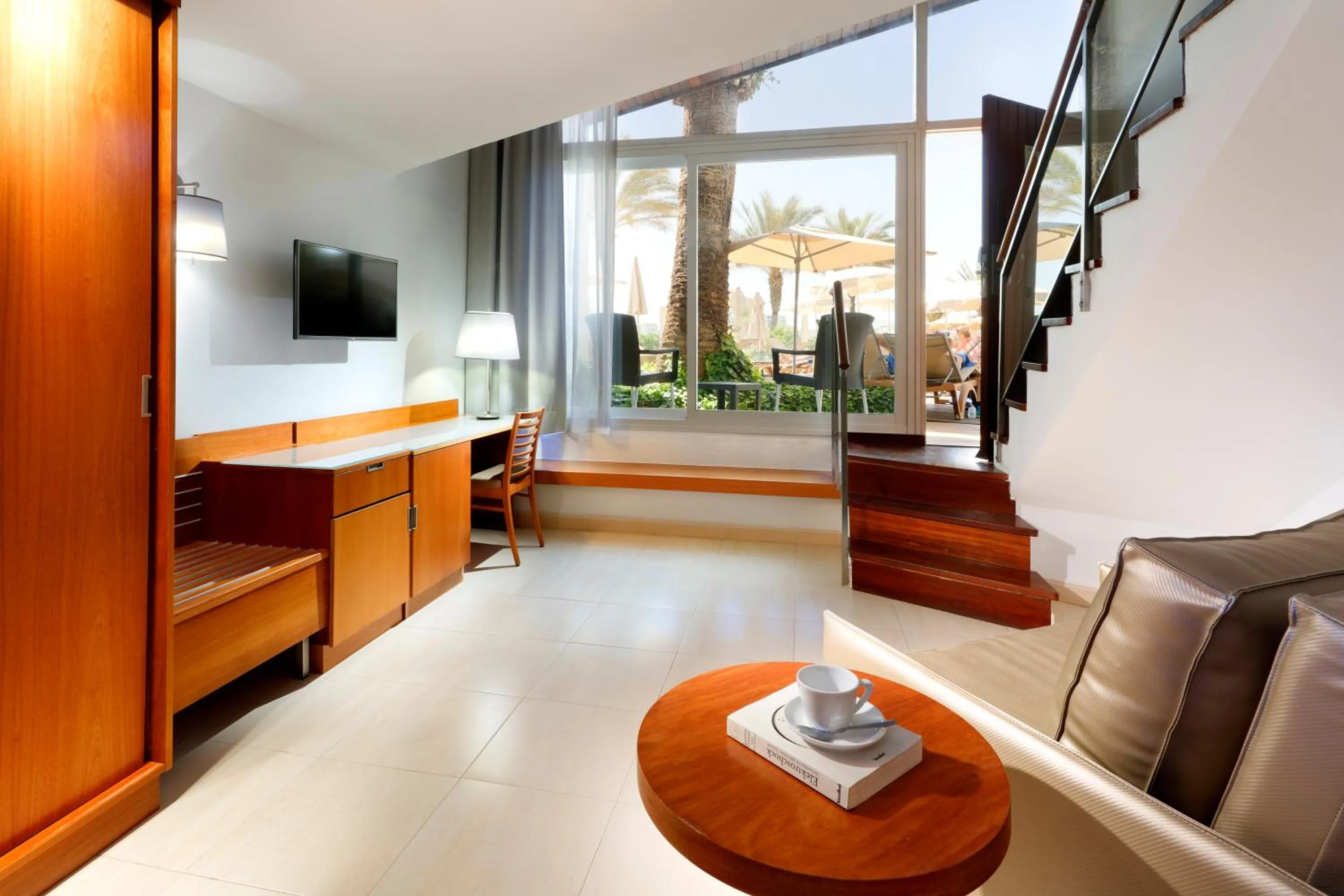 Seating area, Bed in Palladium Hotel Palmyra - Adults Only