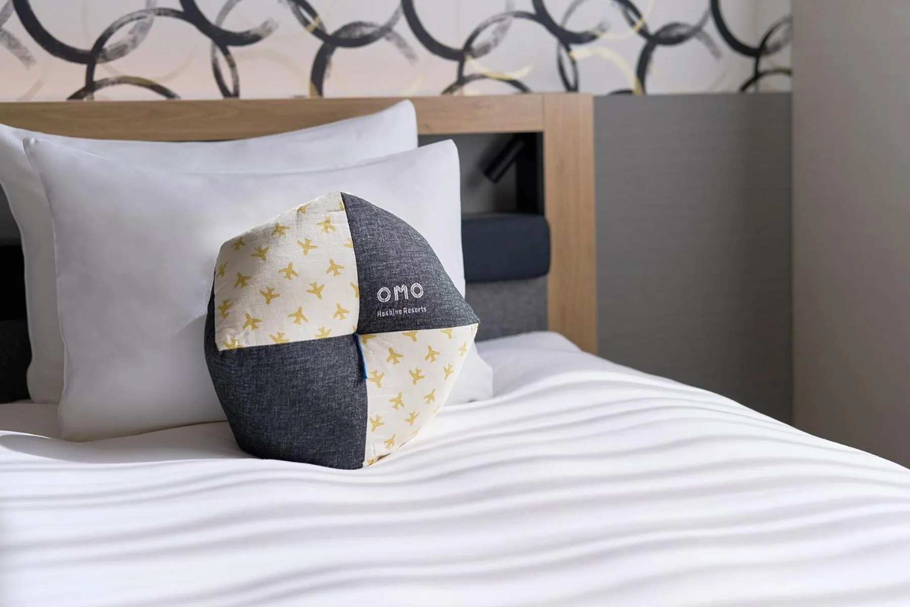 Bed in OMO Kansai Airport by Hoshino Resorts