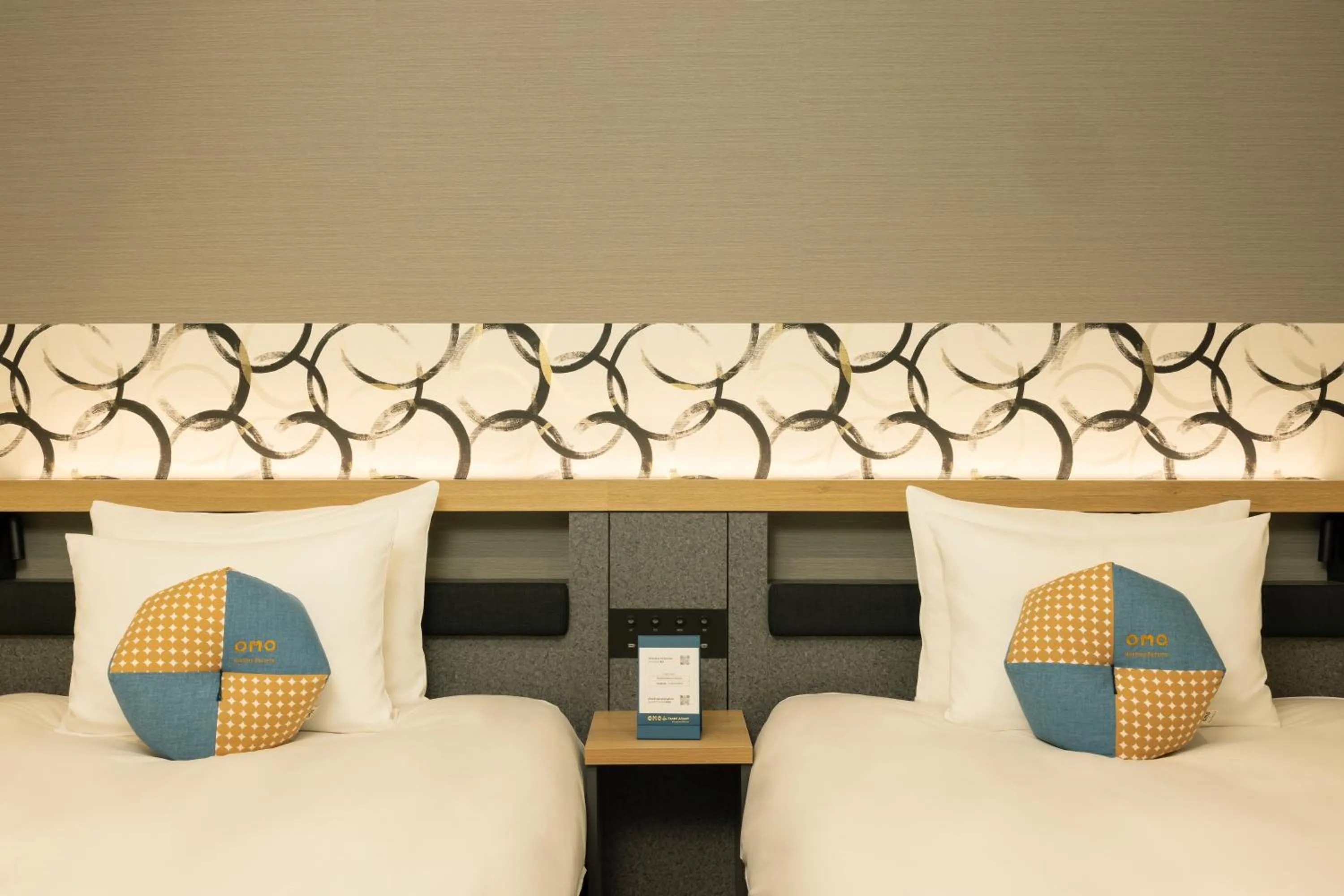 Bed in OMO Kansai Airport by Hoshino Resorts