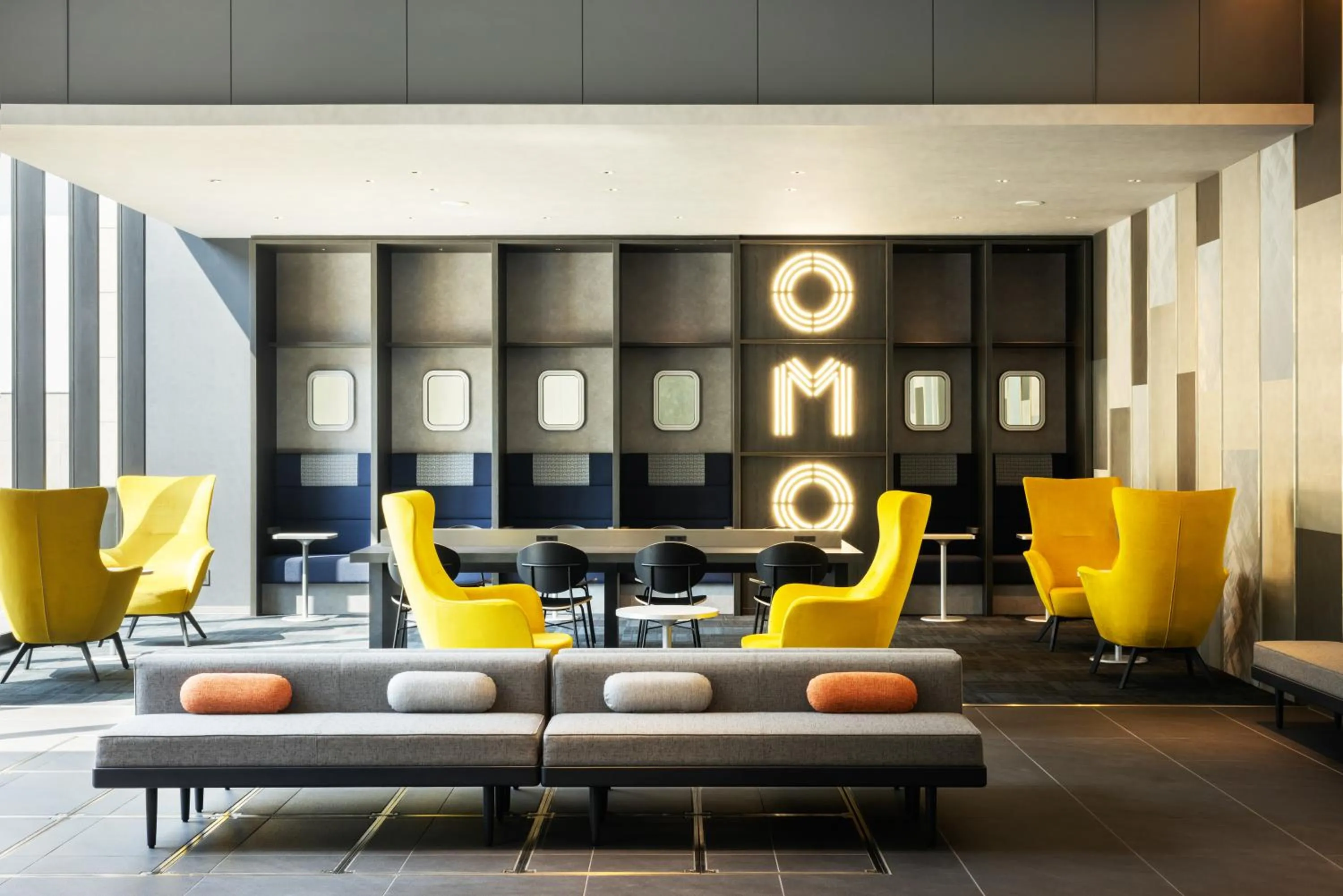 Communal lounge/ TV room in OMO Kansai Airport by Hoshino Resorts