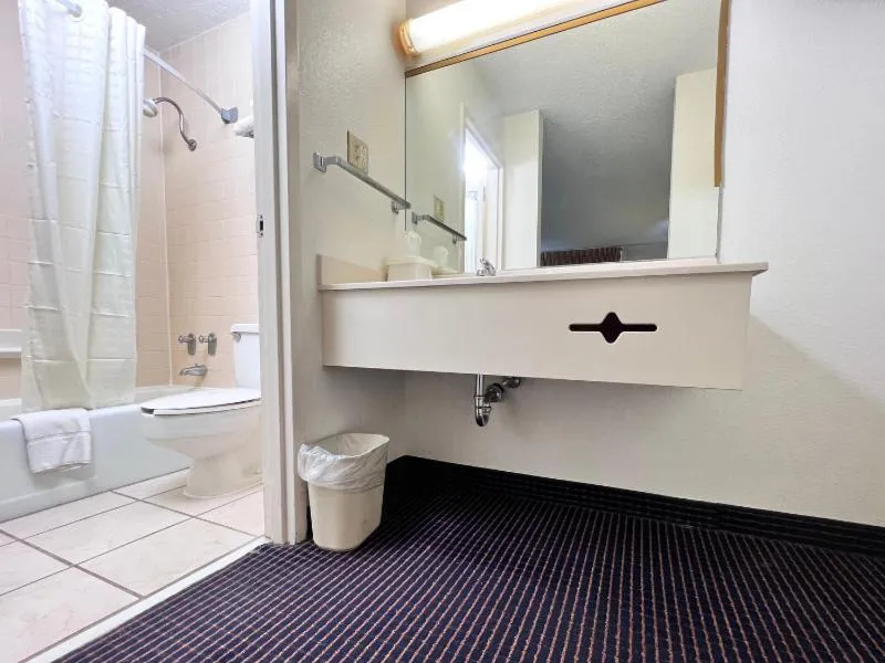 Bathroom in Heritage Inn and Suites