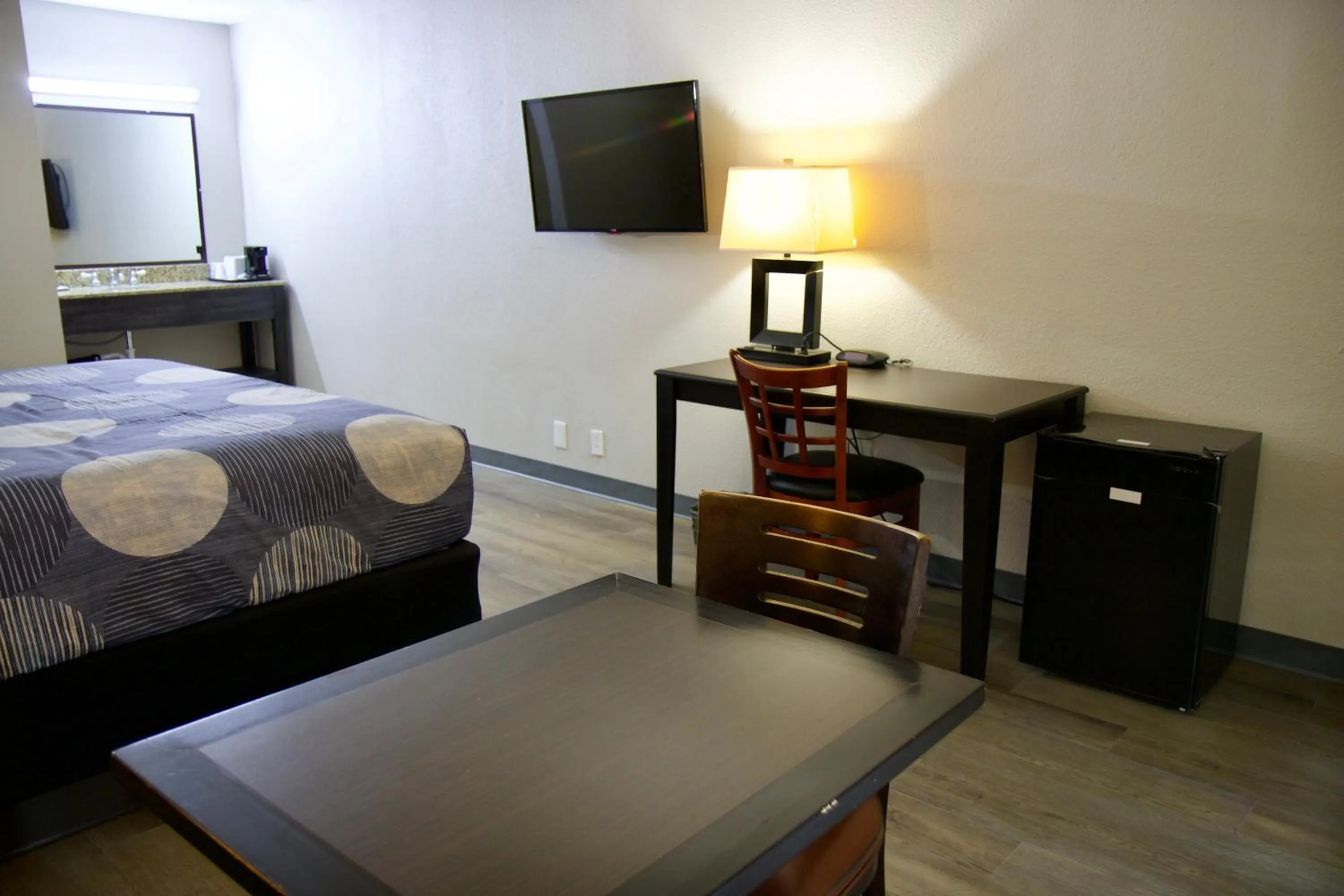 Bed in Heritage Inn and Suites