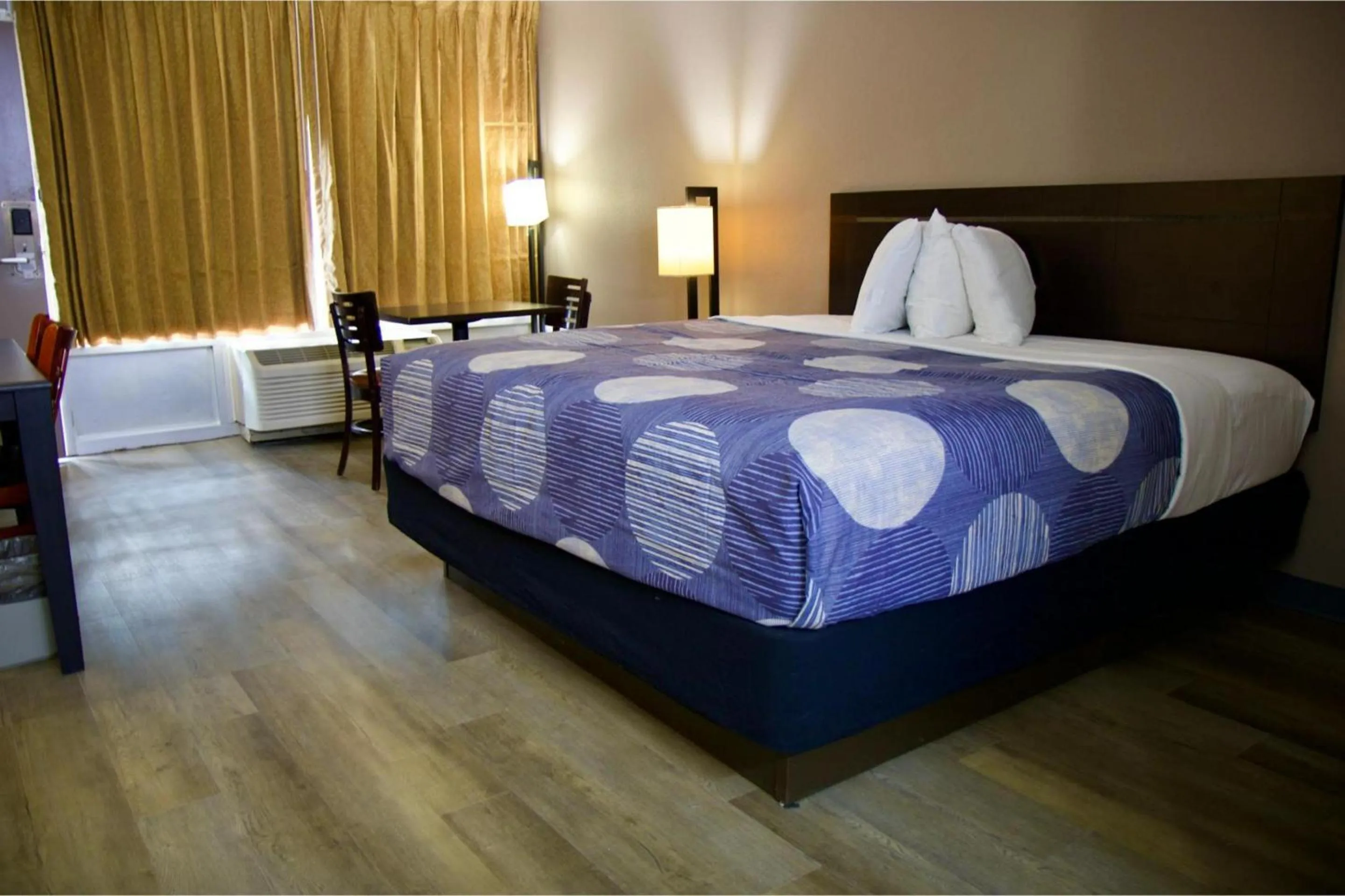 Bedroom, Bed in Heritage Inn & Suites by Capital O Baton Rouge I 10