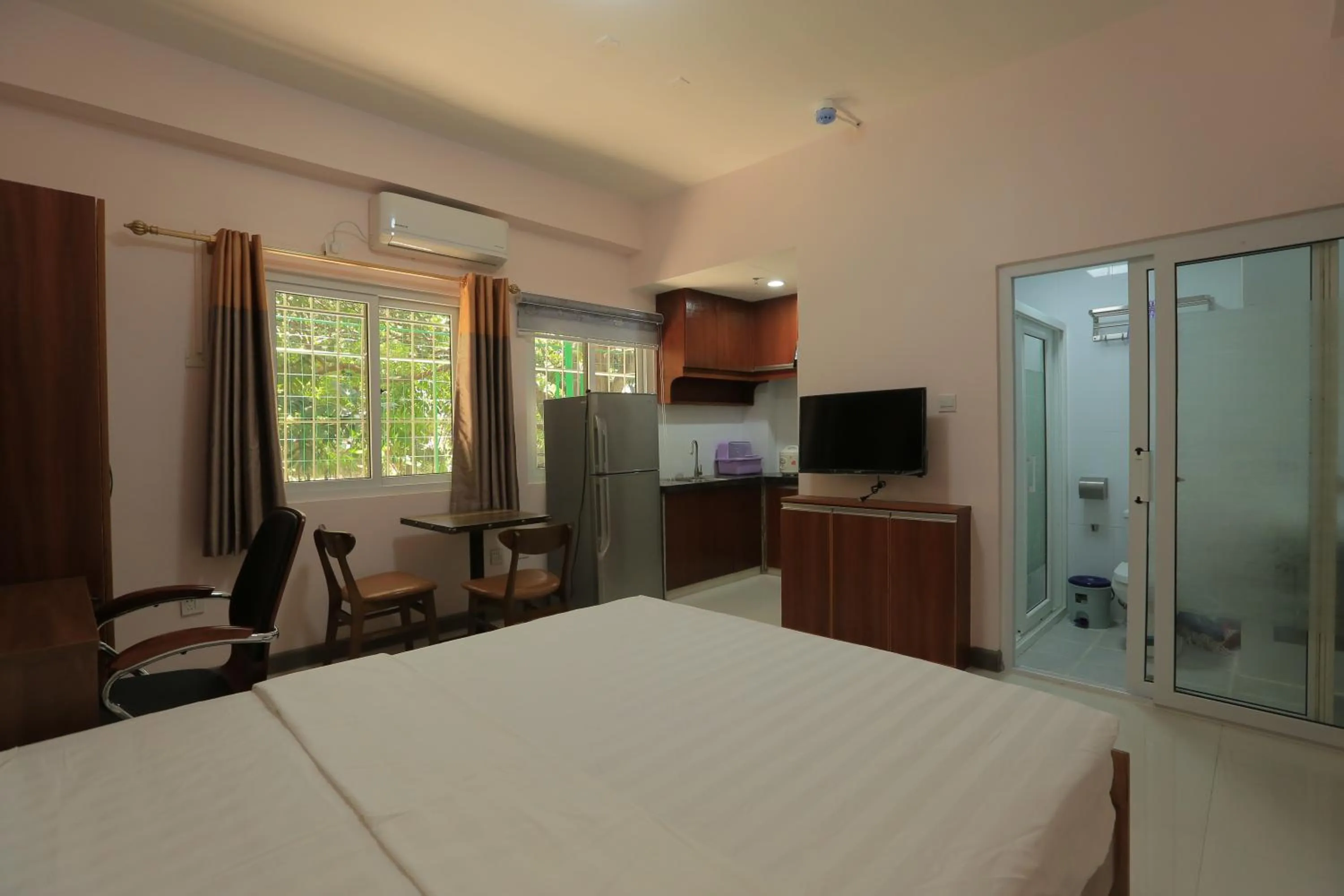 Bed in RUJIA Condotel Corp.