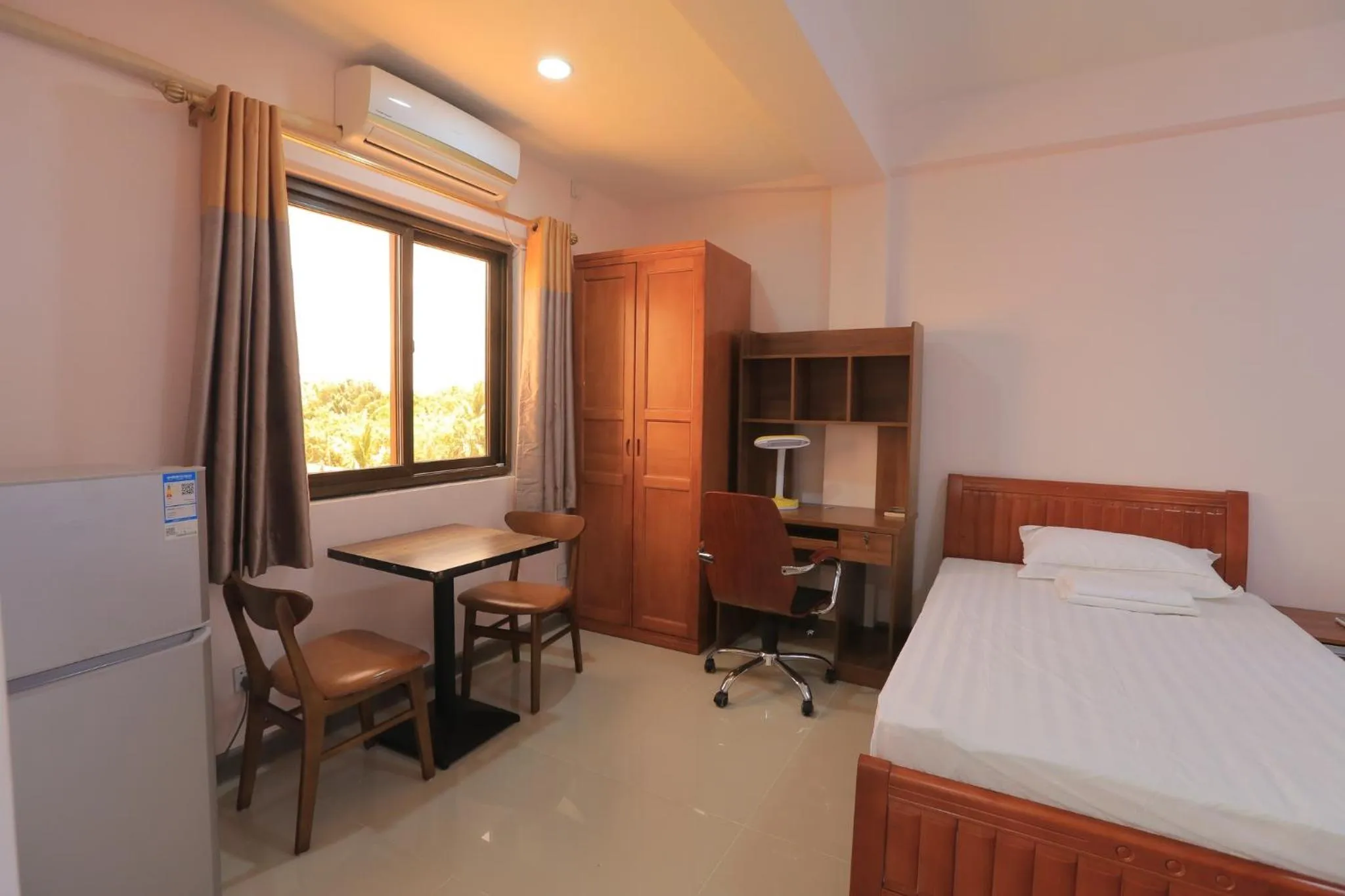 Bed in RUJIA Condotel Corp.