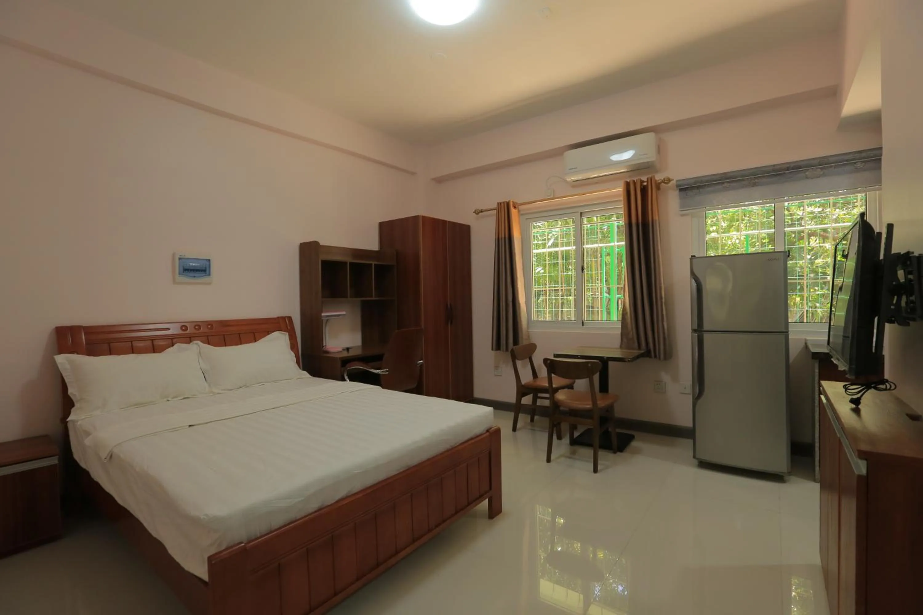 Bed in RUJIA Condotel Corp.