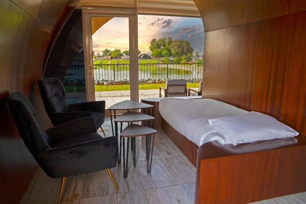 Bed in Nirvana Retreat By Patanjali Wellness Initiative