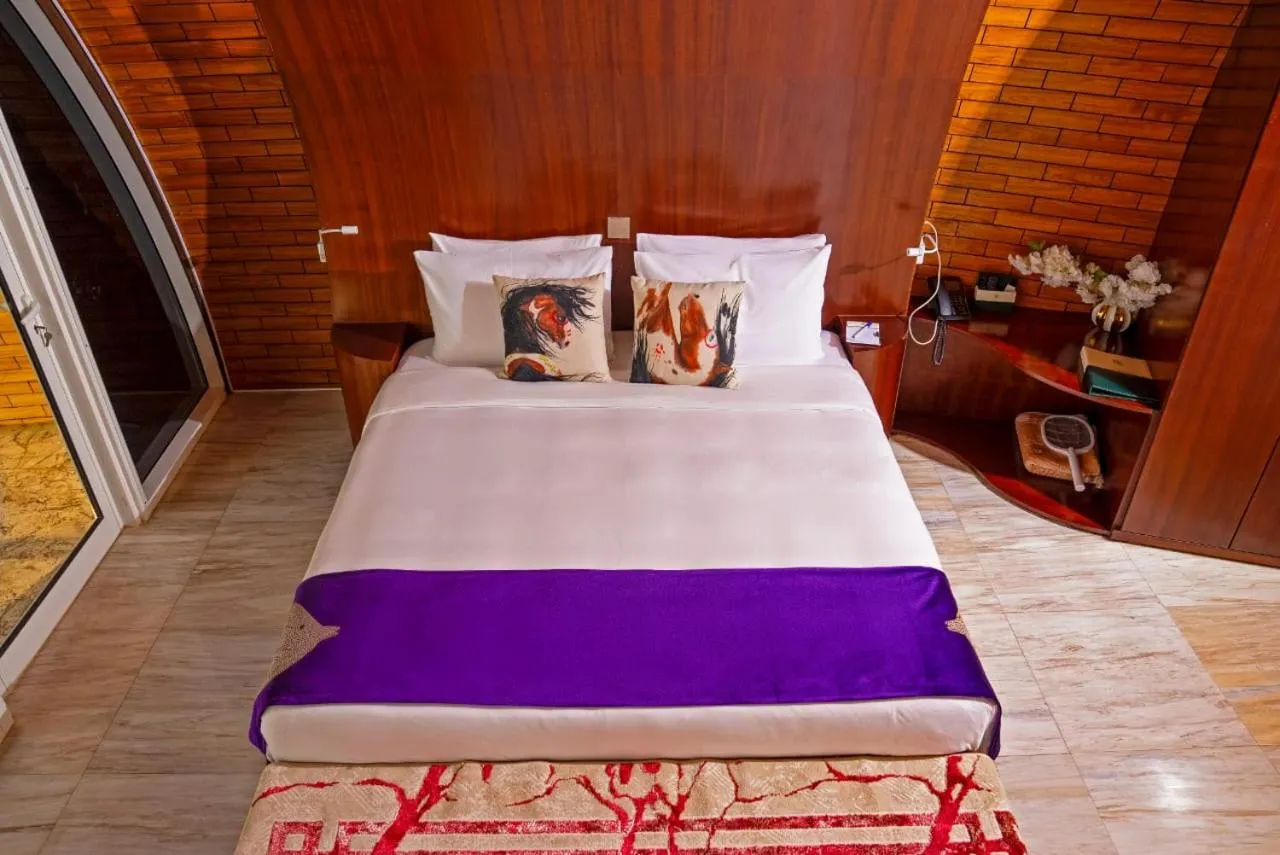 Bed in Nirvana Retreat By Patanjali Wellness Initiative