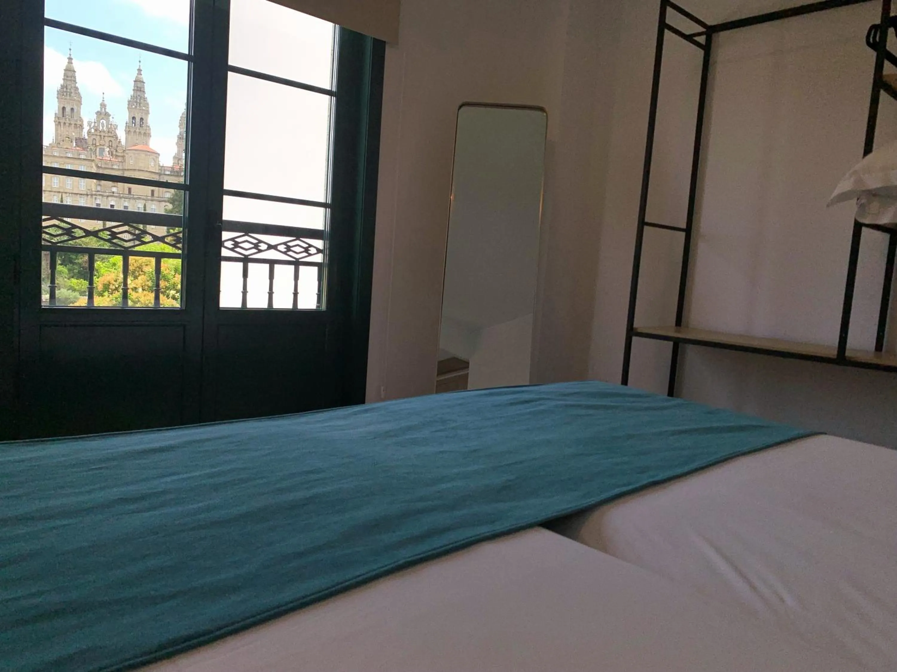 Landmark view, Bed in Hotel Pombal Rooms