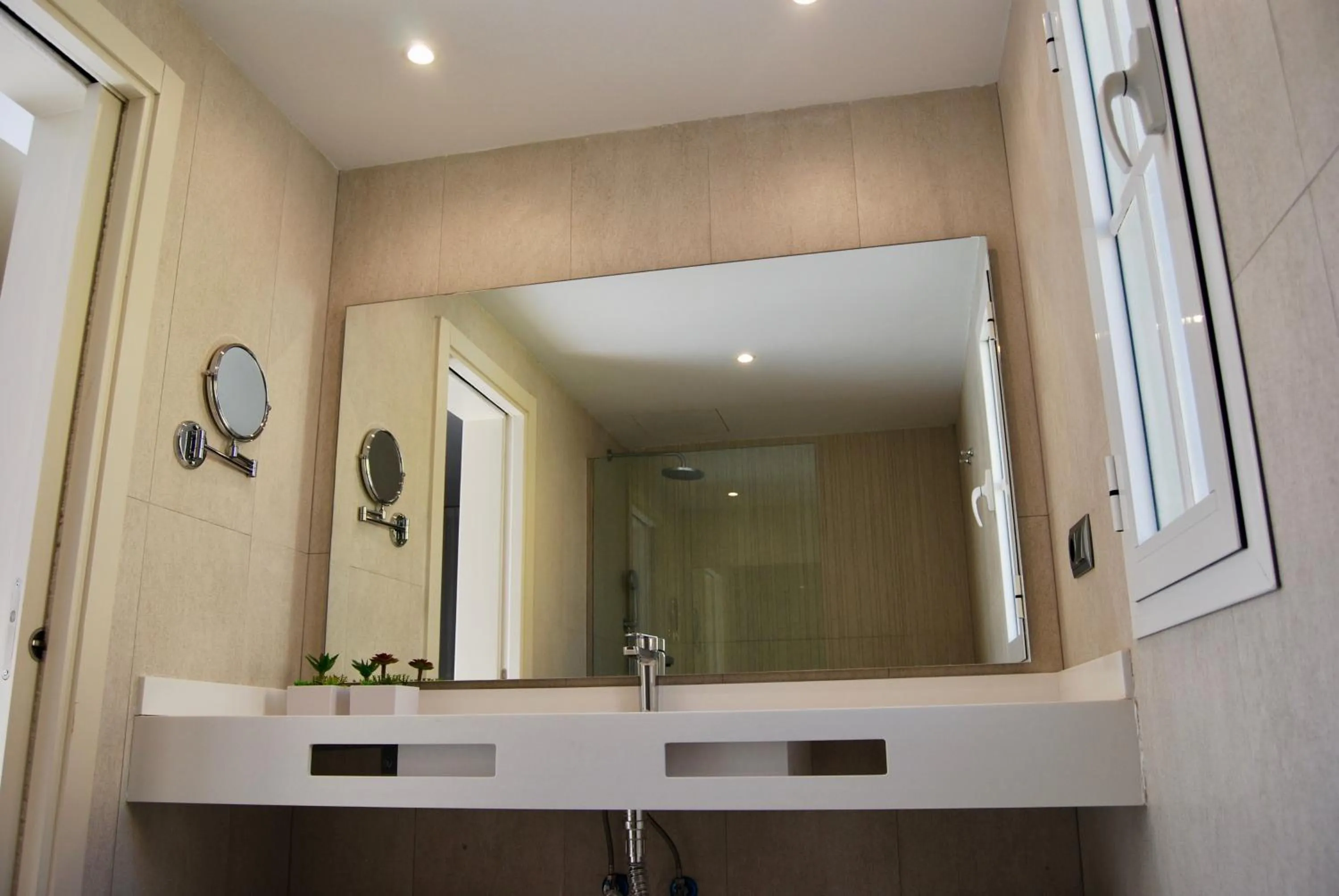 Bathroom in Broncemar Beach Suites