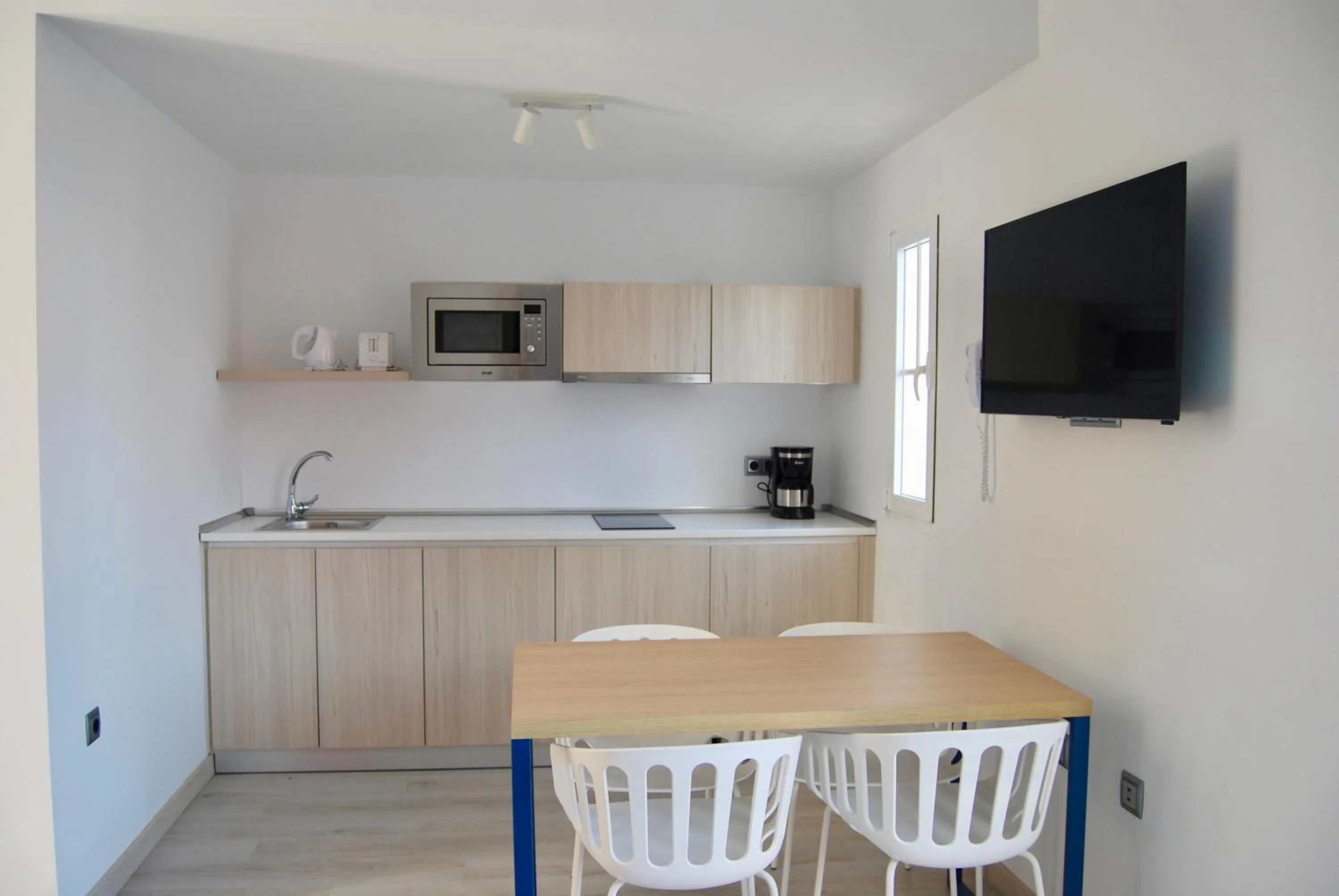 Kitchen or kitchenette in Broncemar Beach Suites