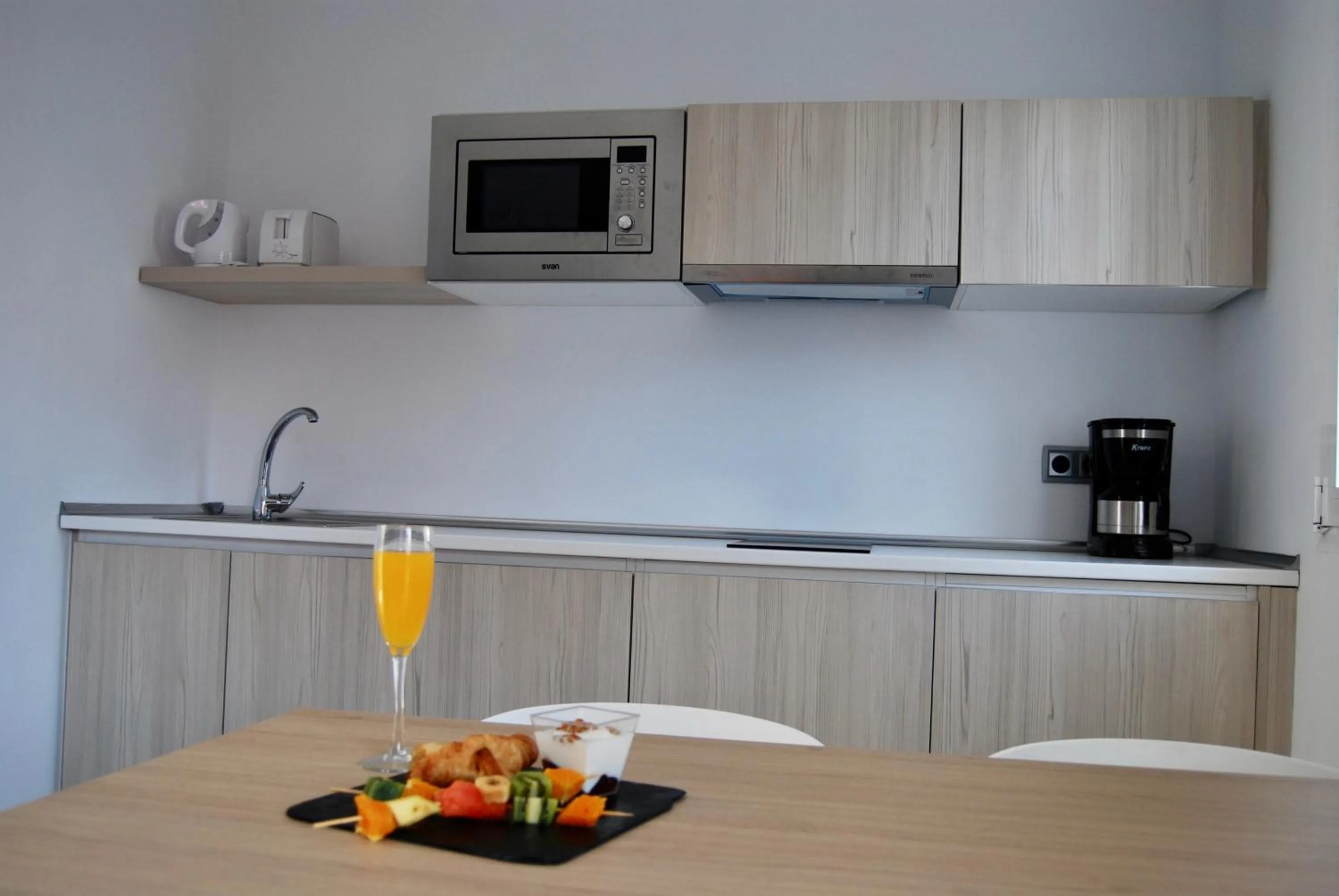 Kitchen or kitchenette in Broncemar Beach Suites