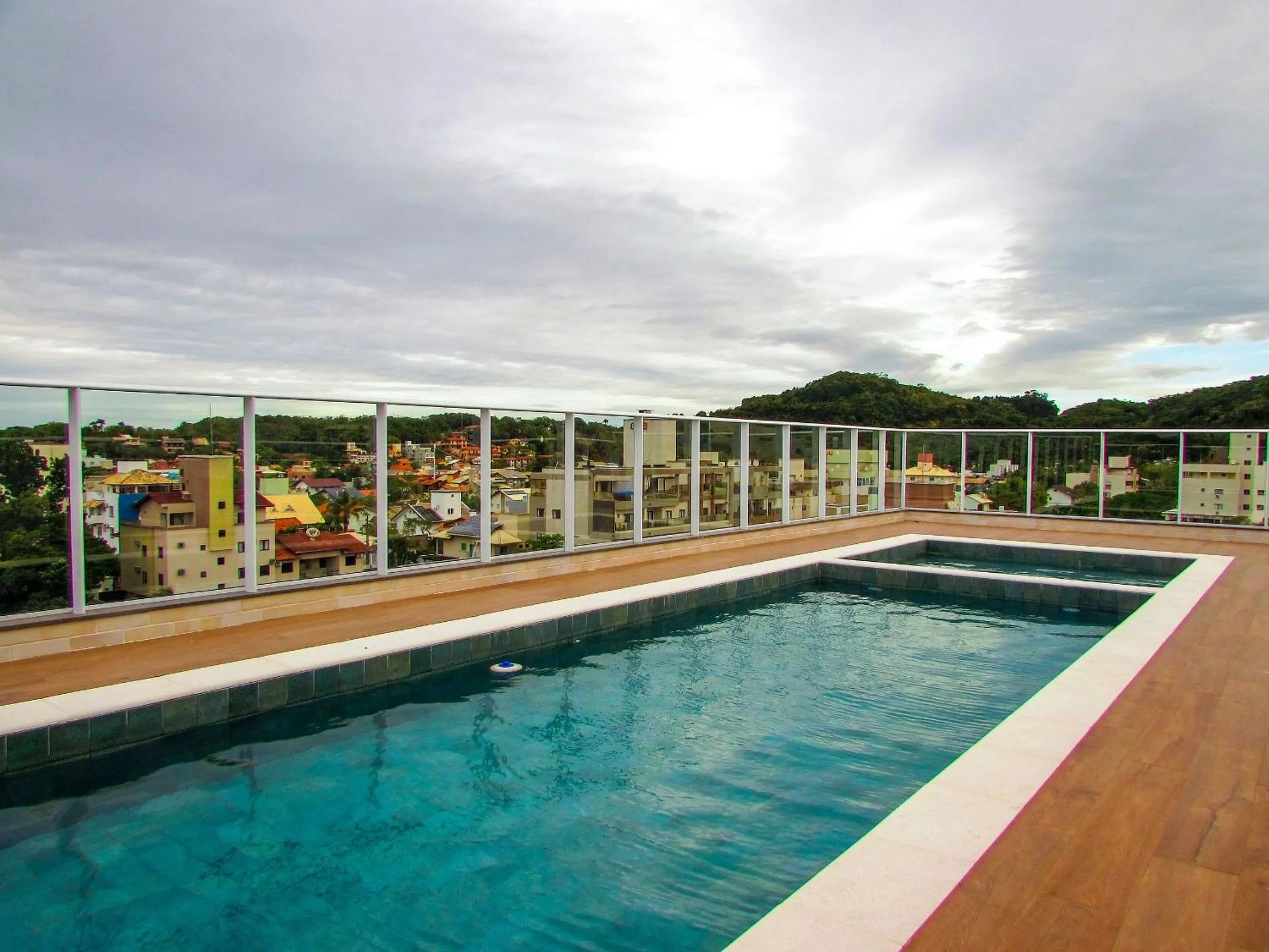 Swimming pool in VDC-225 Moderno monoambiente a pocos mts del mar de Bombinhas