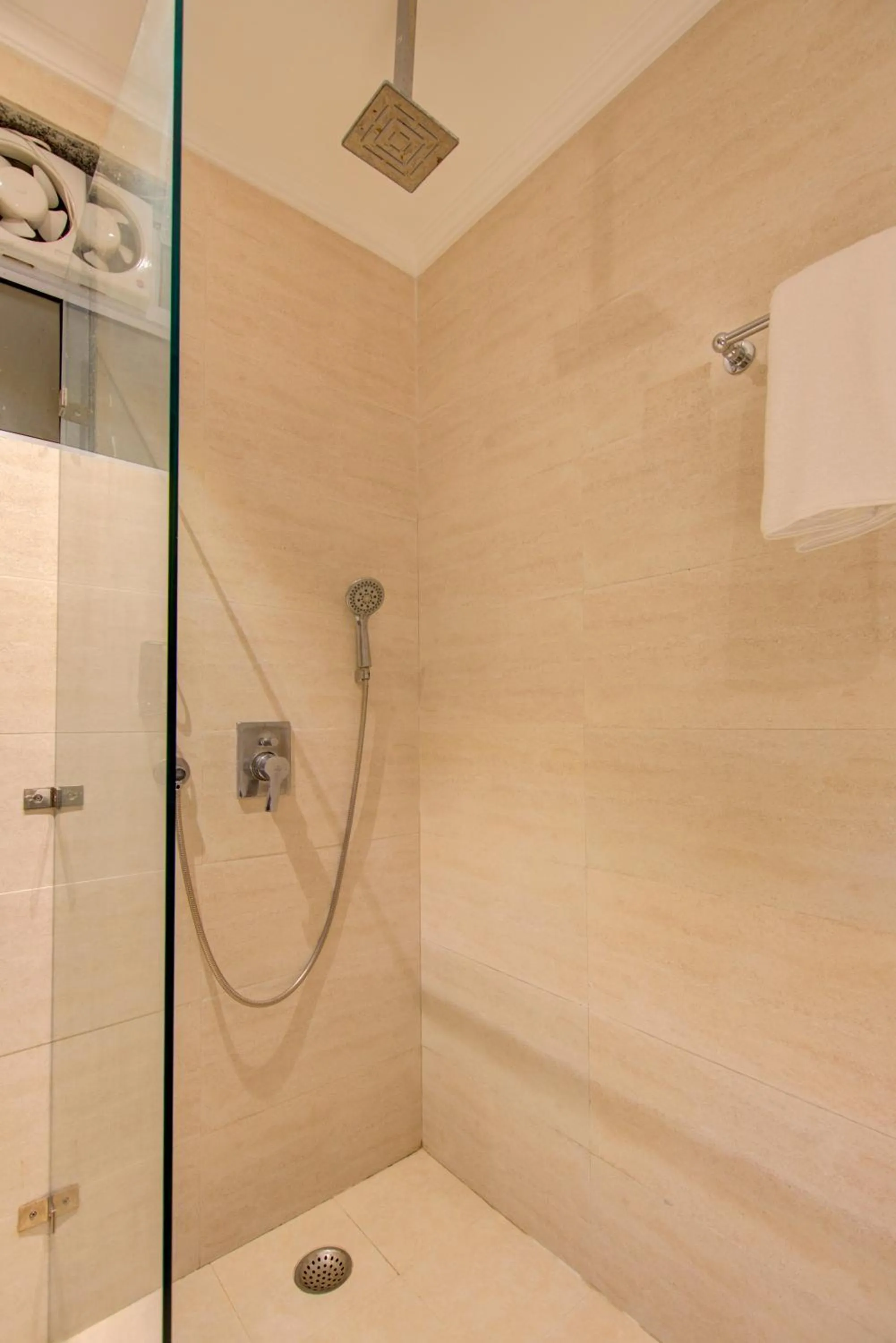 Shower in The Elevate Hotel Near Delhi Airport With- Free Airport PICKUP