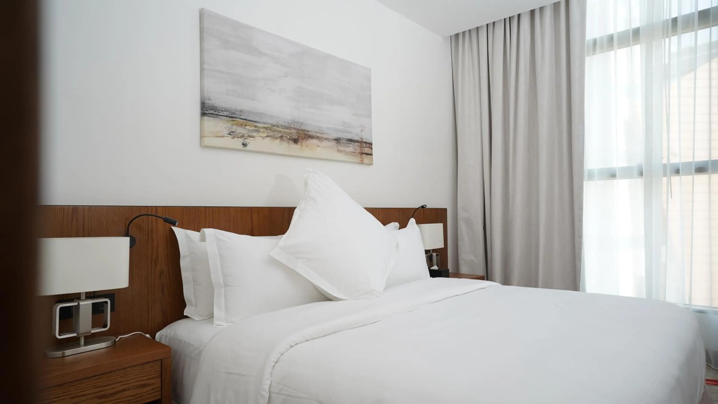 Bed in Jasmine Garden Hotel